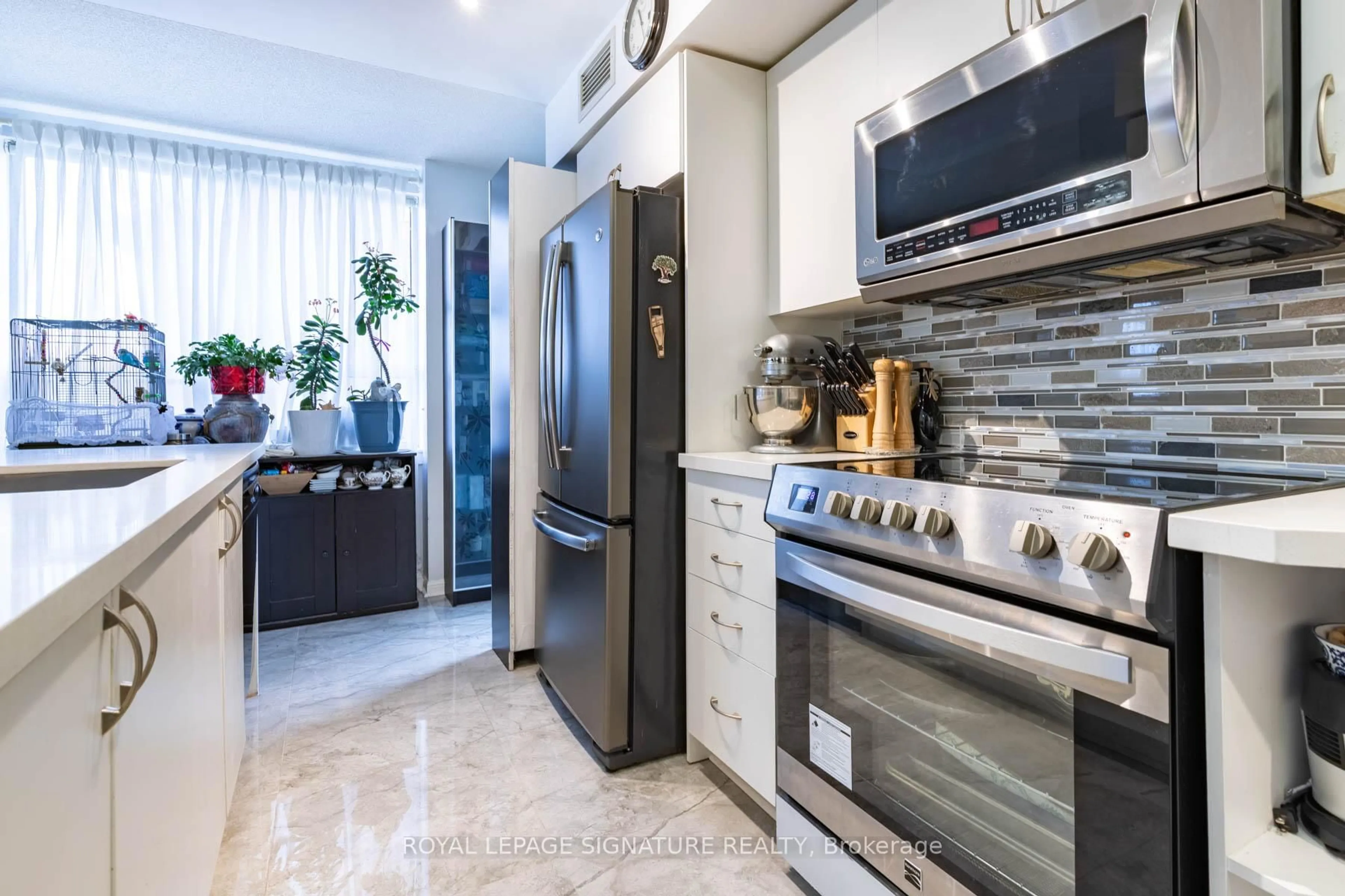 Contemporary kitchen, ceramic/tile floor for 4 Elsinore Path #203, Toronto Ontario M8V 4G7