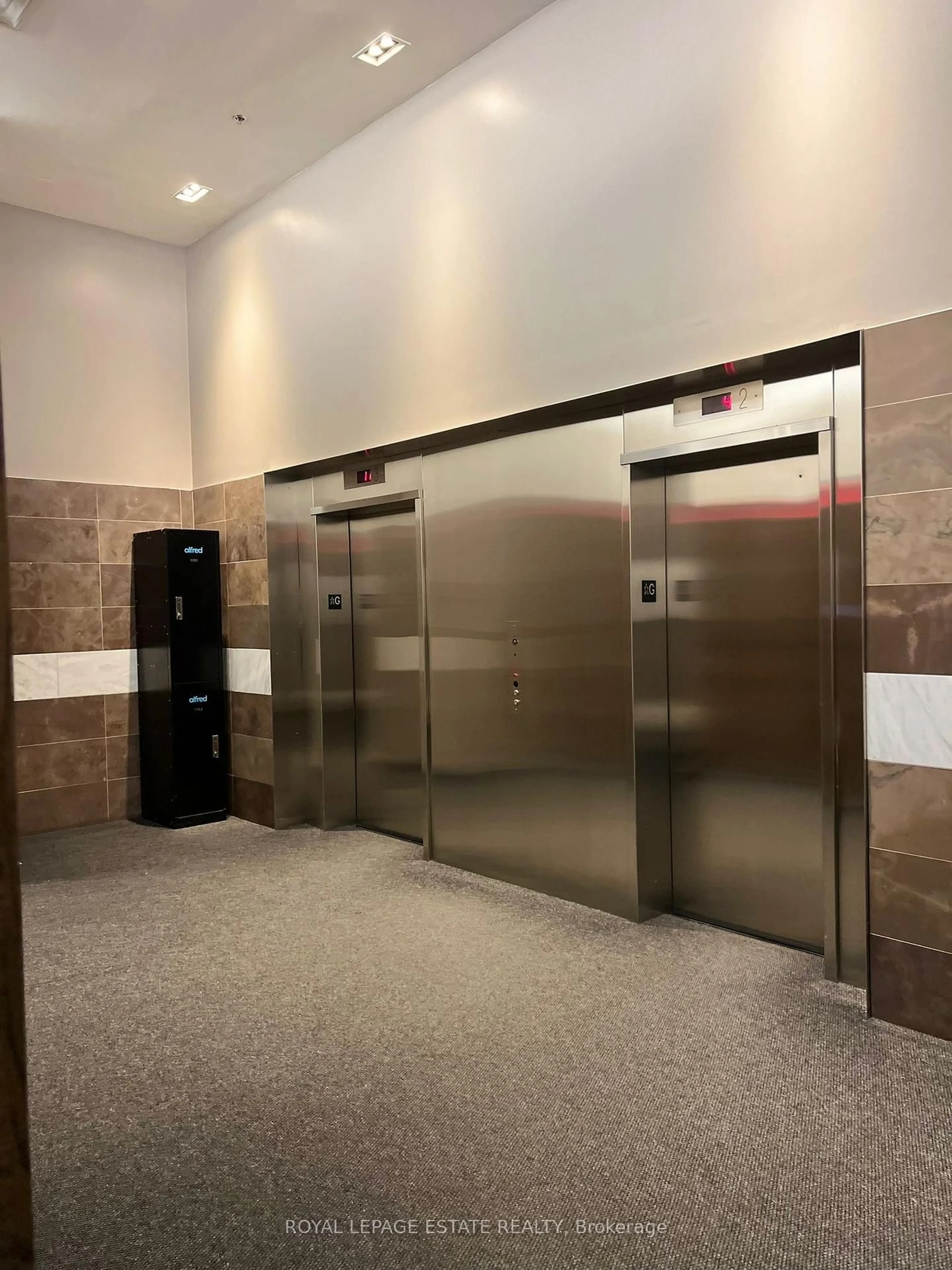 Indoor foyer for 20 Joe Shuster Way #612, Toronto Ontario M6K 0A3