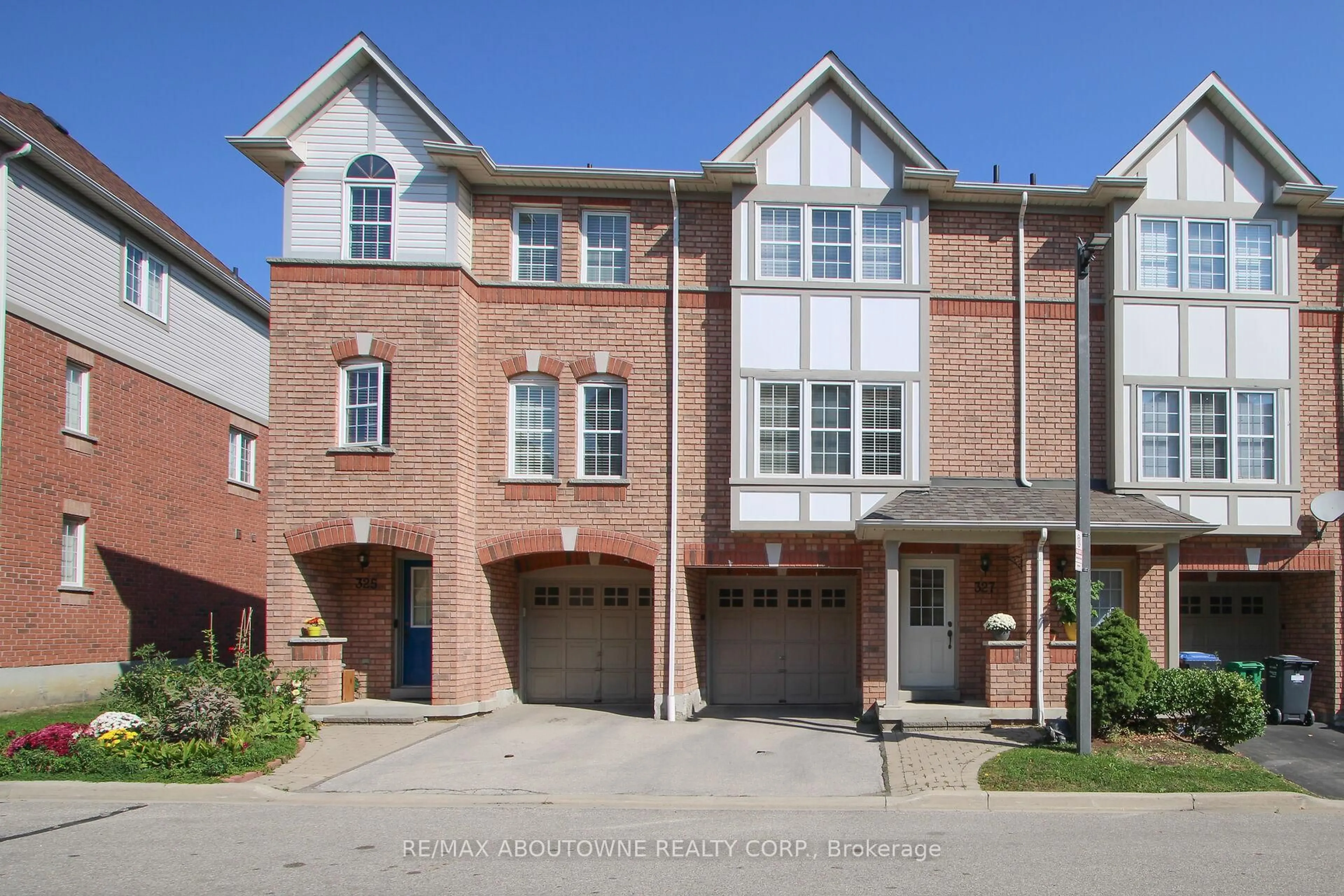 Home with brick exterior material, street for 3030 Breakwater Crt #327, Mississauga Ontario L5B 4N9