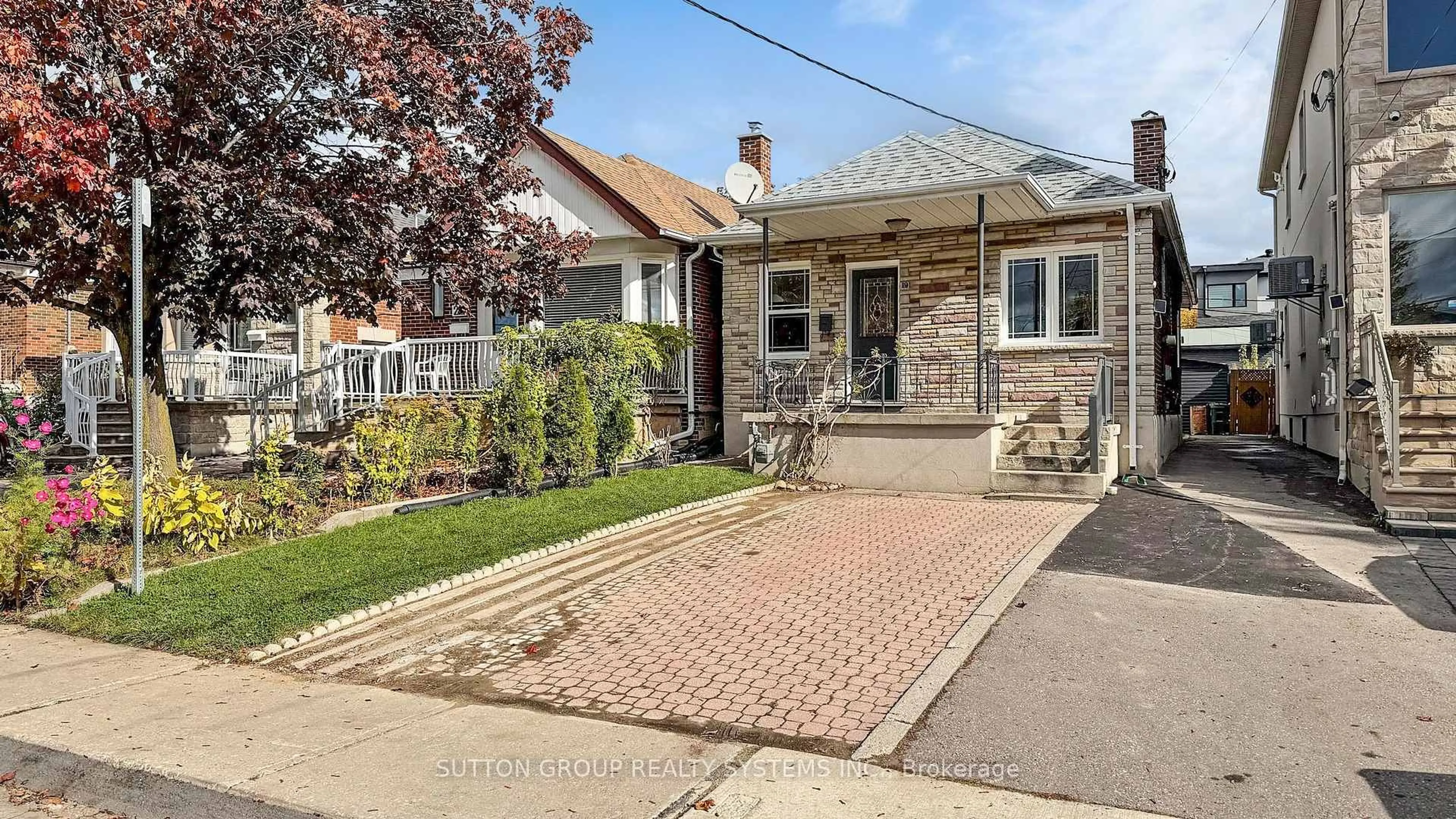 Home with brick exterior material, street for 19 Montcalm Ave, Toronto Ontario M6E 4N5