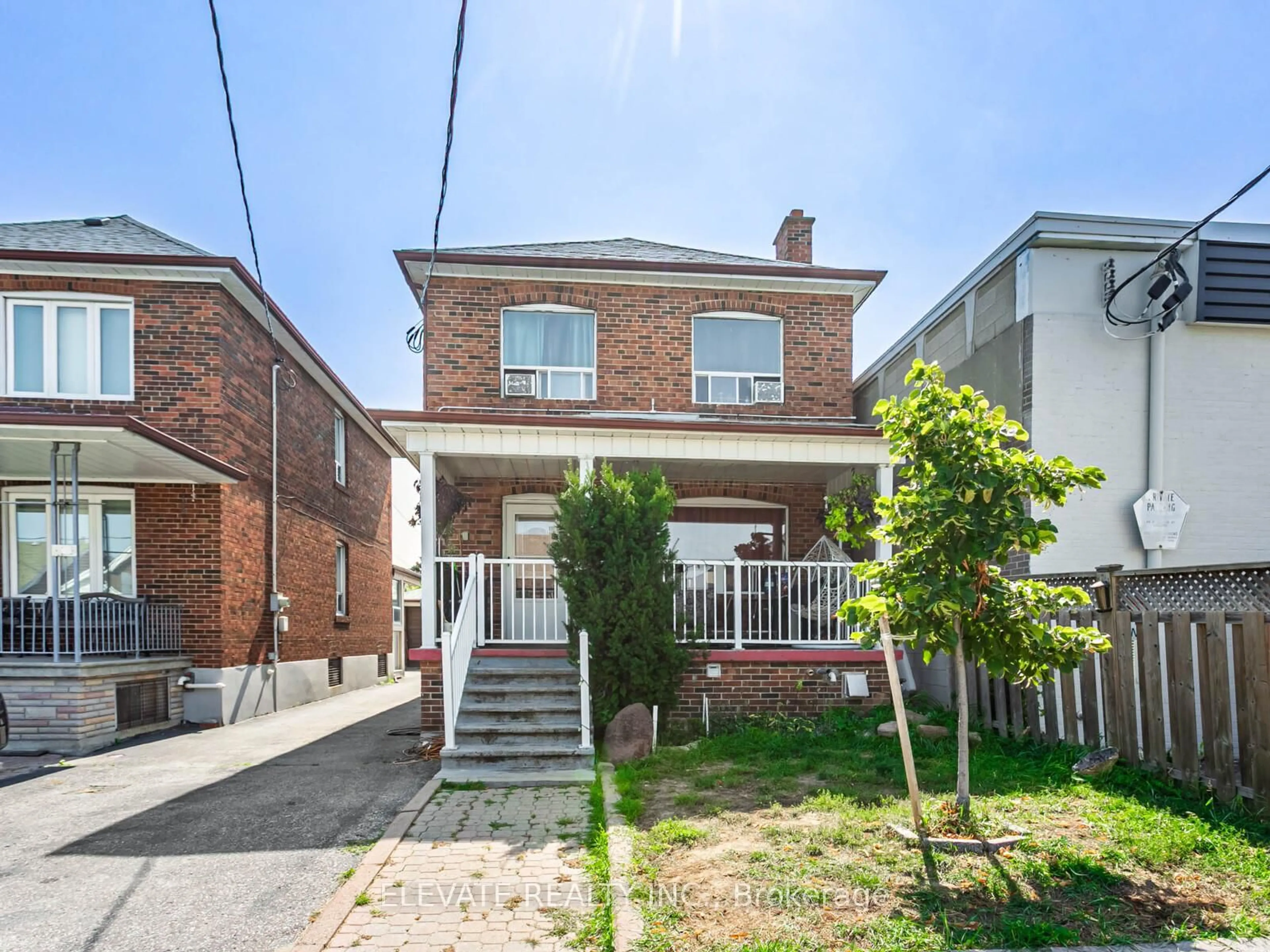 Home with brick exterior material, street for 247 Belgravia Ave, Toronto Ontario M6E 2M9