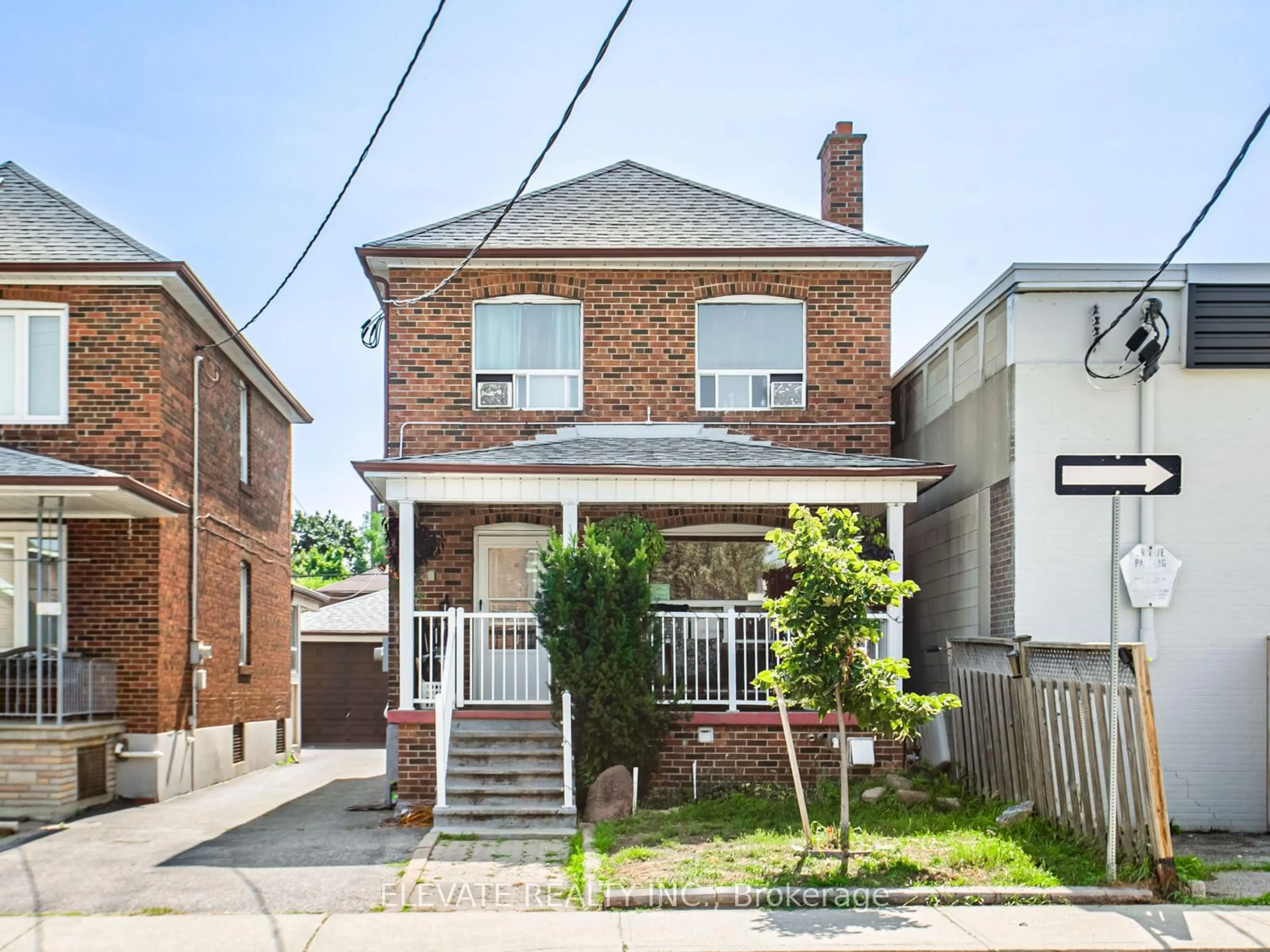 Home with brick exterior material, street for 247 Belgravia Ave, Toronto Ontario M6E 2M9