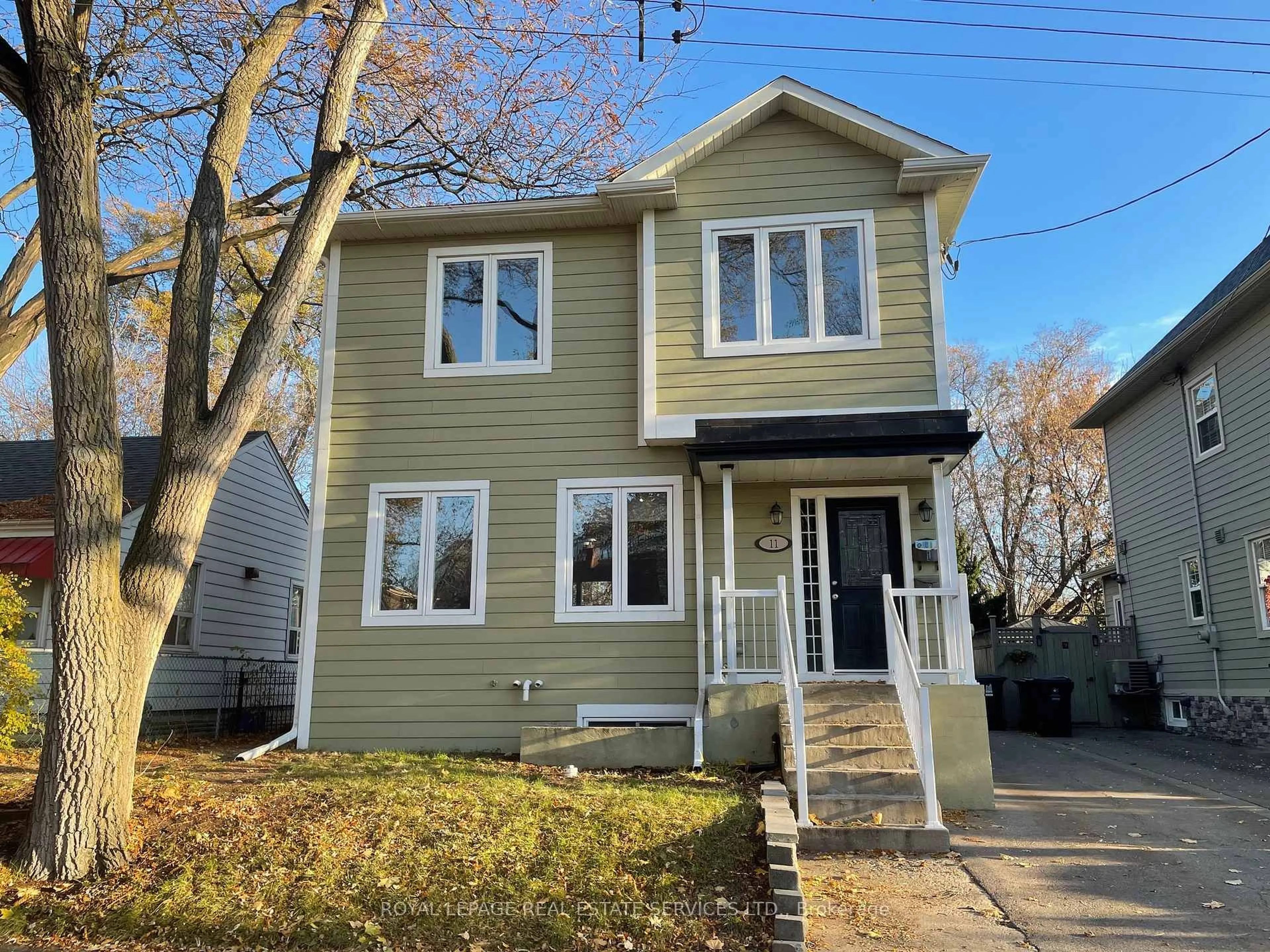 Home with vinyl exterior material, street for 11 Uno Dr, Toronto Ontario M8Z 3N7