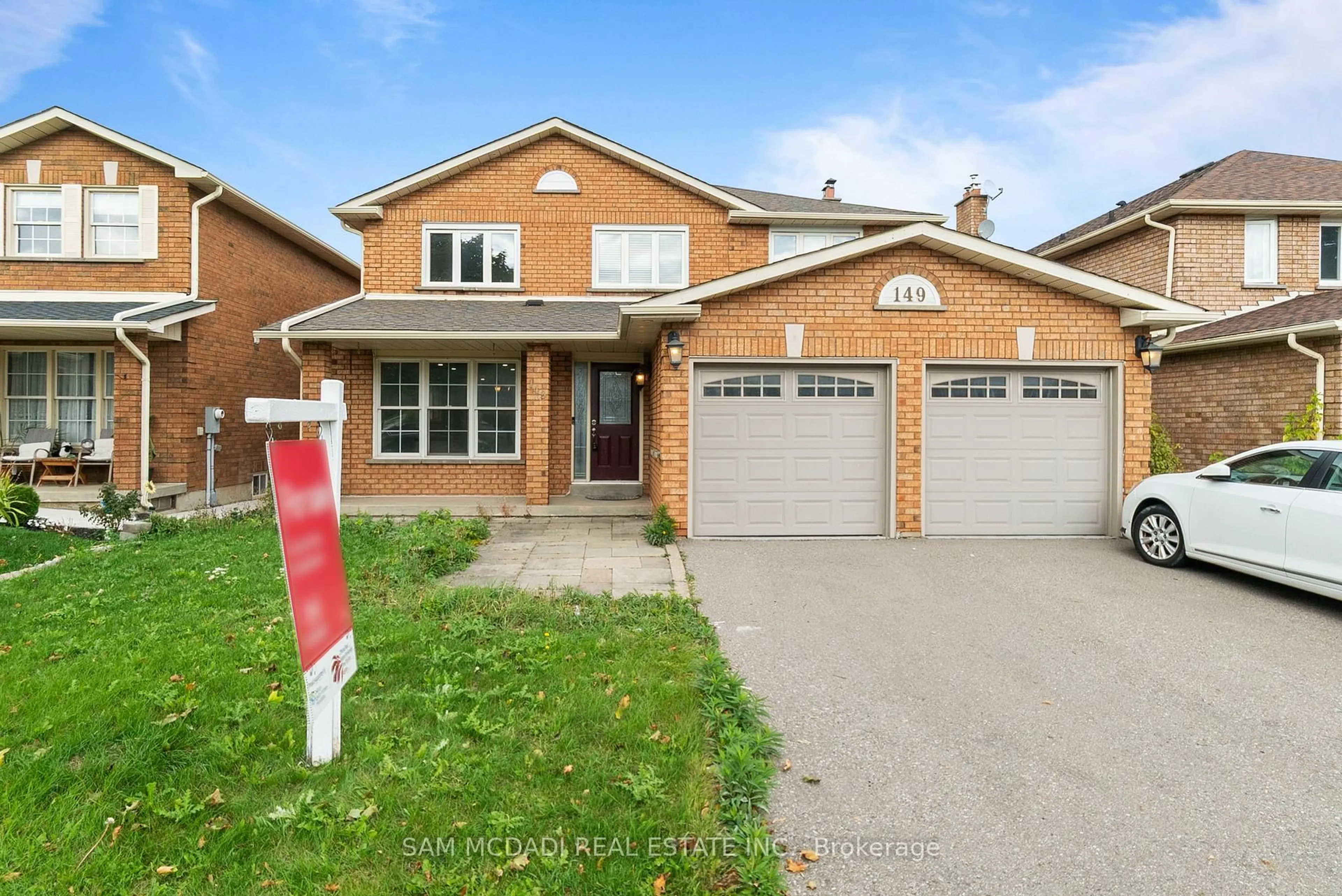 Home with brick exterior material, street for 149 Sunforest Dr, Brampton Ontario L6Z 4B7