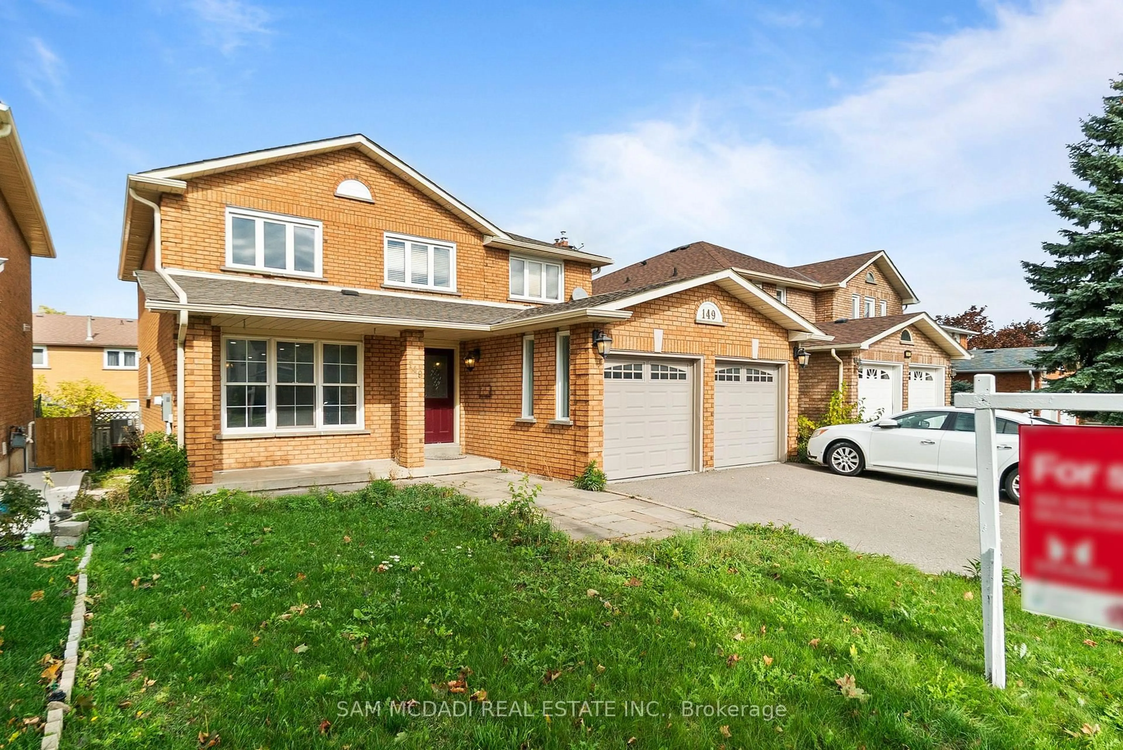 Home with brick exterior material, street for 149 Sunforest Dr, Brampton Ontario L6Z 4B7