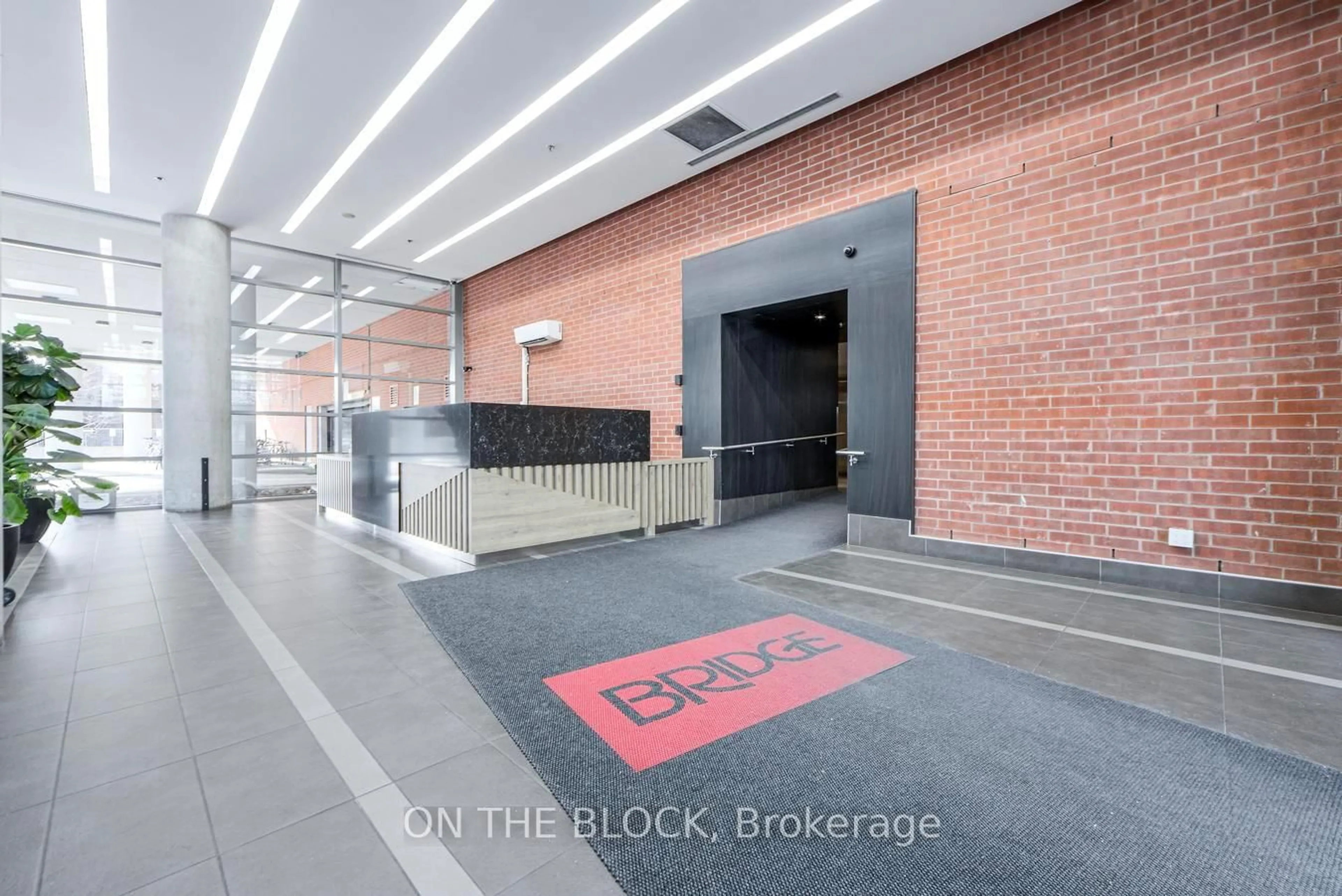 Indoor foyer for 38 Joe Shuster Way #302, Toronto Ontario M6K 0A5