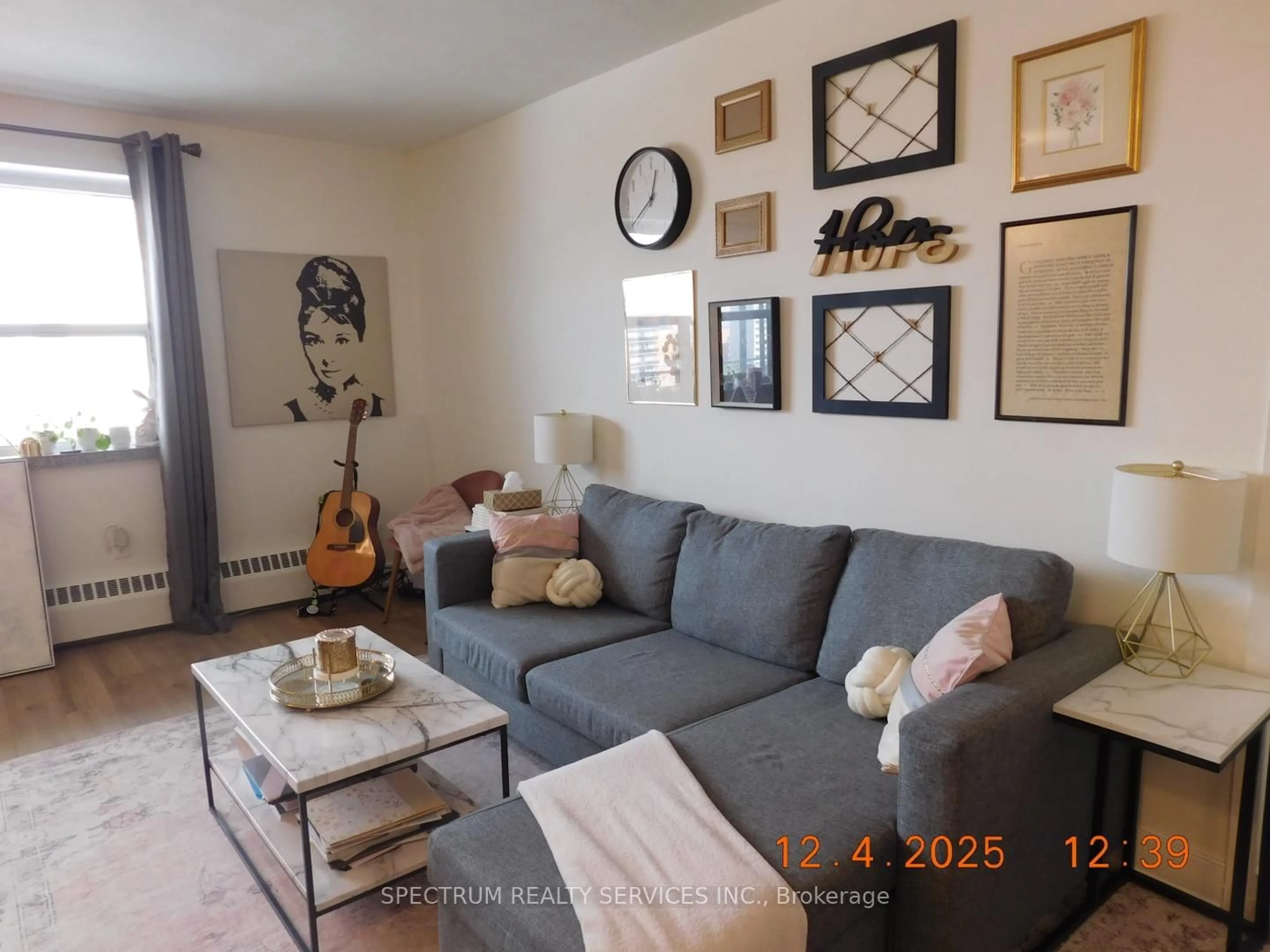 Living room with furniture, wood/laminate floor for 3320 Fieldgate Dr #808, Mississauga Ontario L4X 2J2