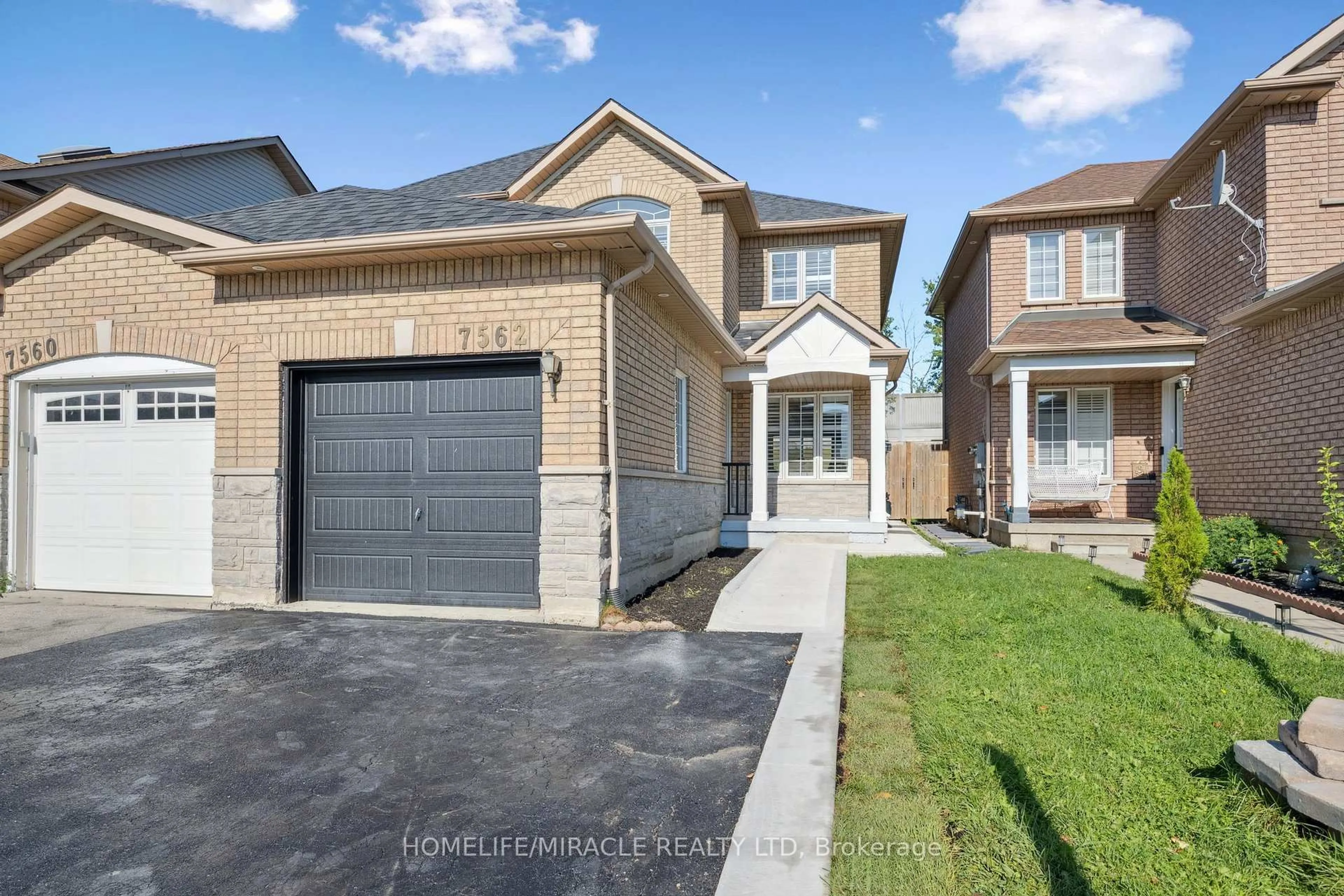 Home with brick exterior material, street for 7562 Black Walnut Tr, Mississauga Ontario L5N 8A9