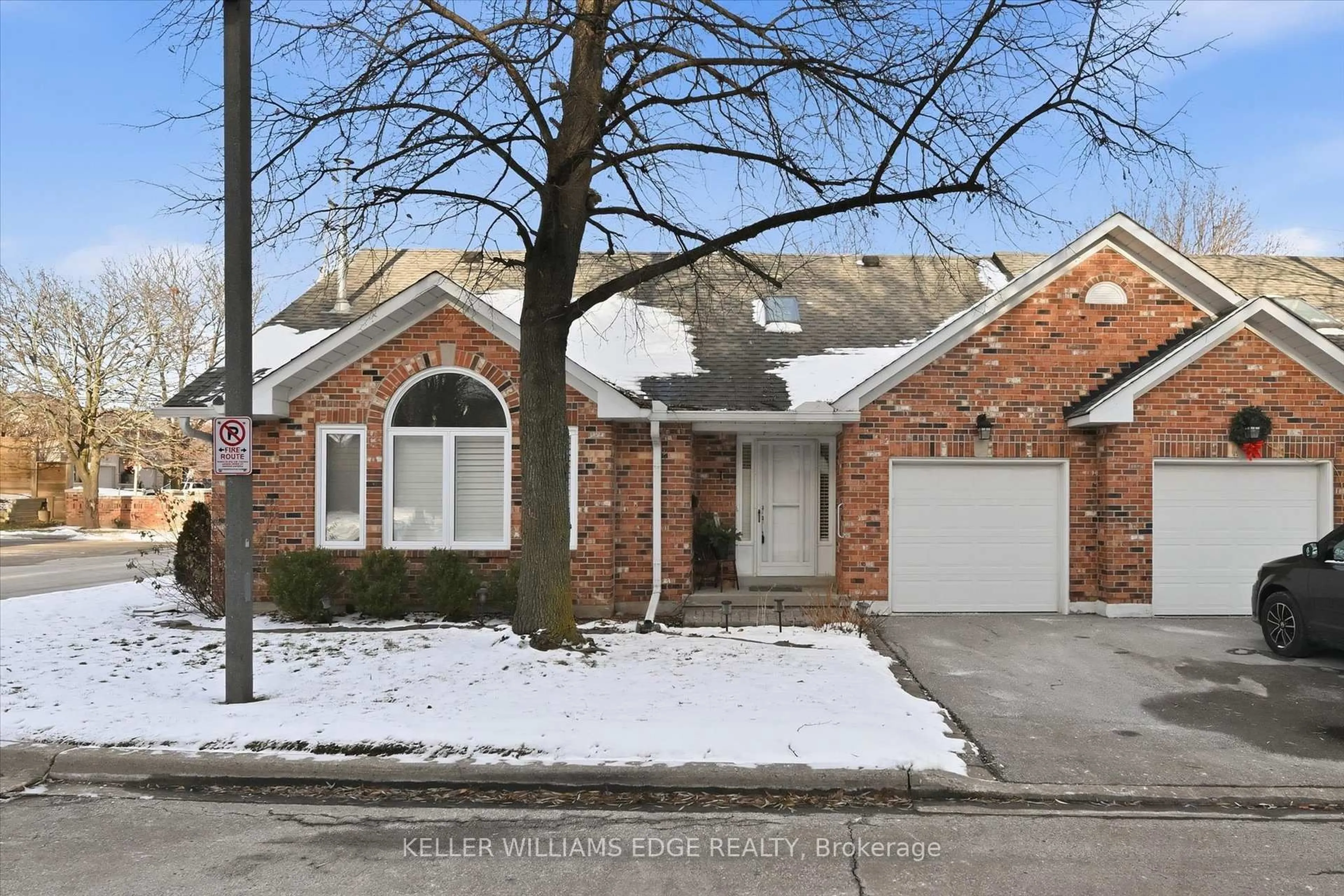 Home with brick exterior material, street for 2230 Walkers Line #1, Burlington Ontario L7M 3Y8