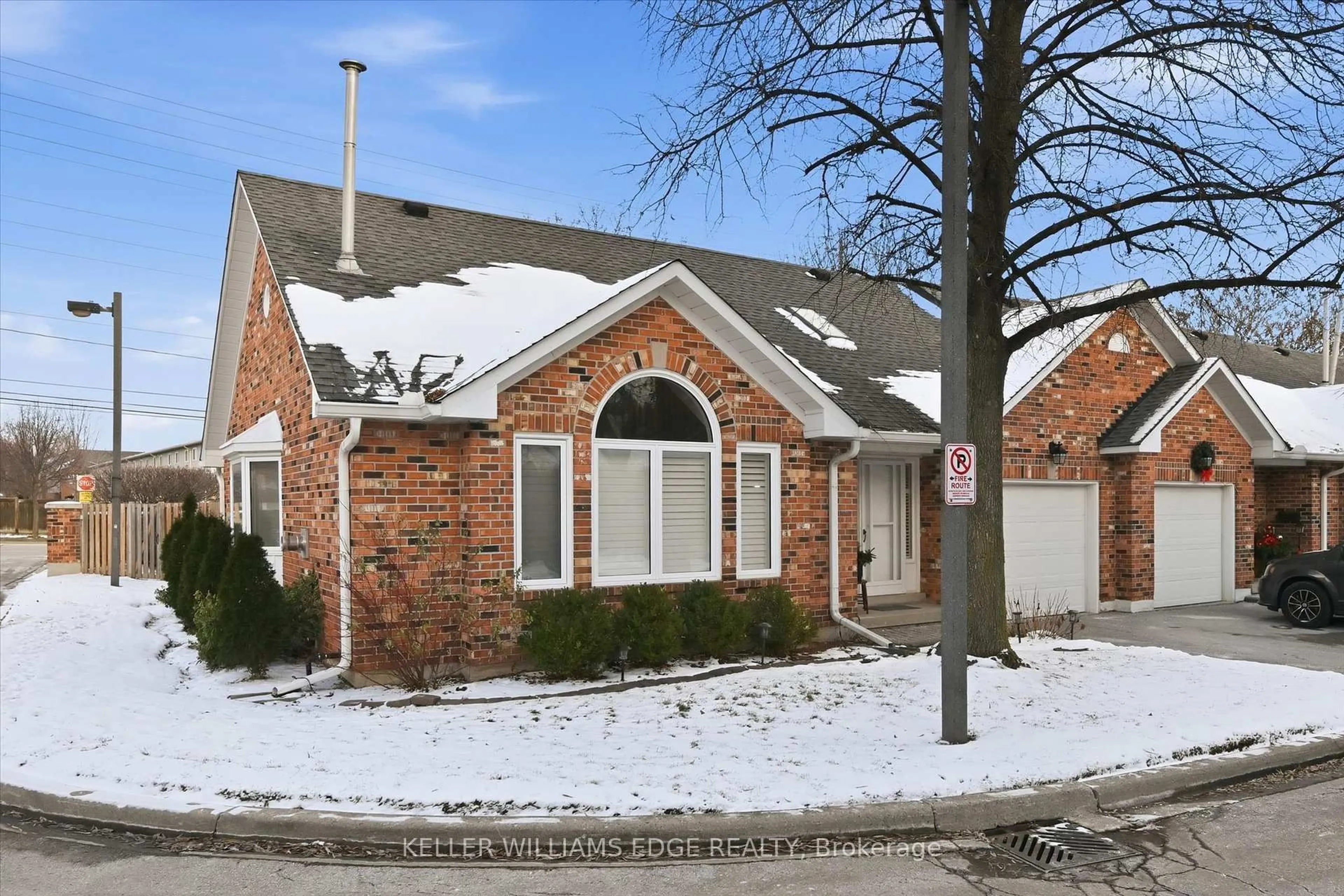 Home with brick exterior material, street for 2230 Walkers Line #1, Burlington Ontario L7M 3Y8