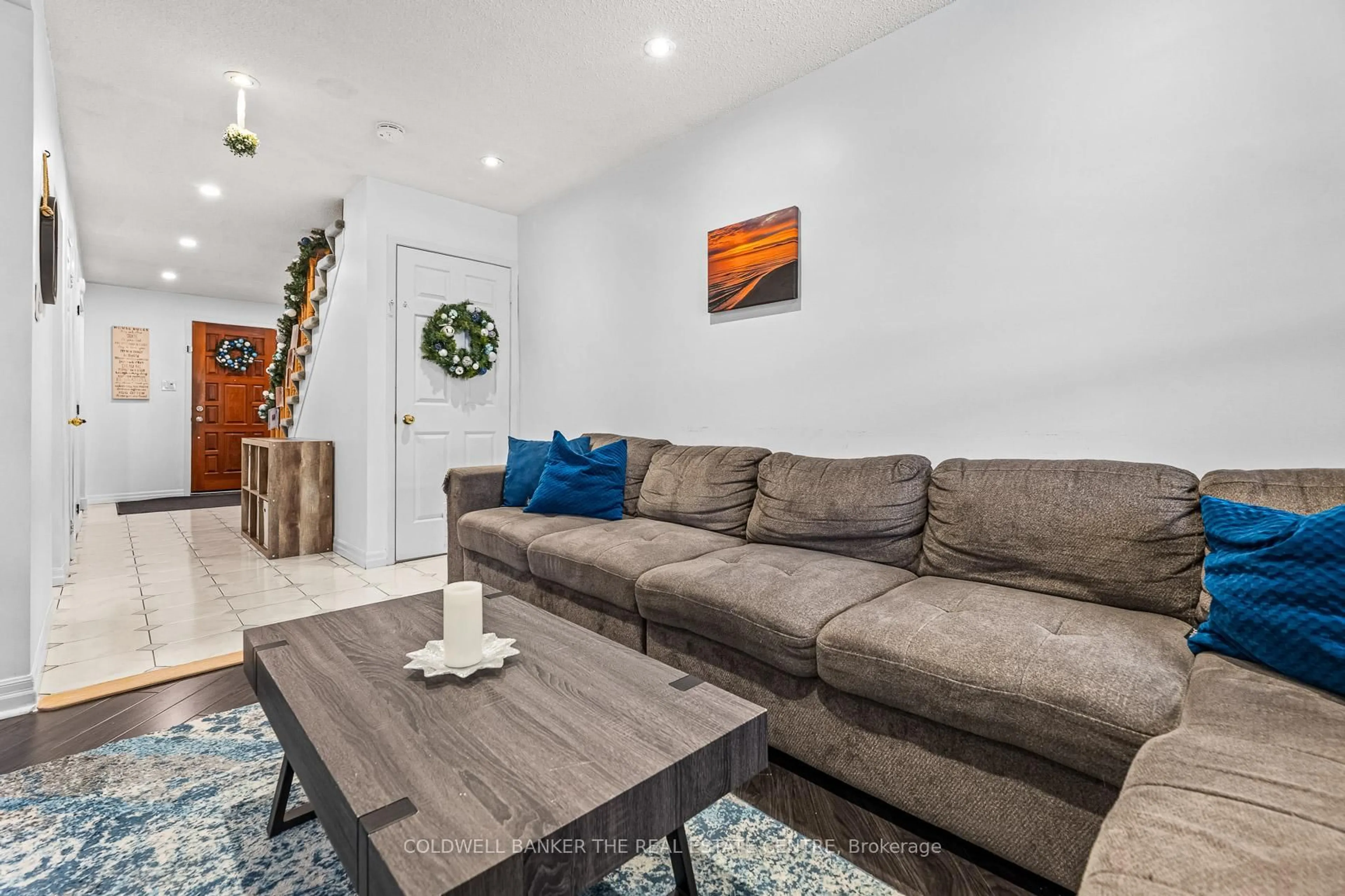 Living room with furniture, unknown for 64 Merton Rd, Brampton Ontario L6V 2V6