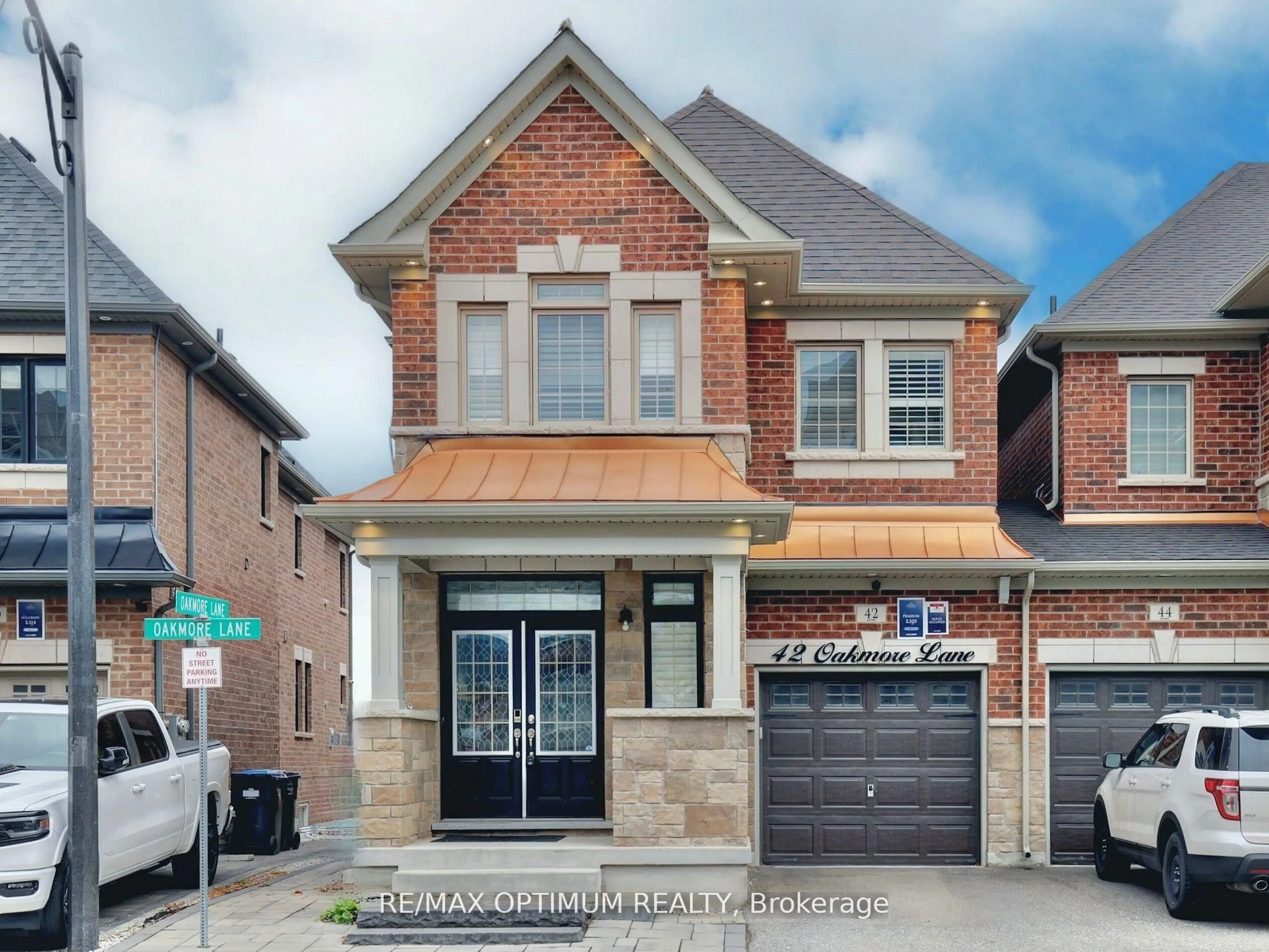 Home with brick exterior material, street for 42 OAKMORE Lane, Brampton Ontario L6Y 6H5
