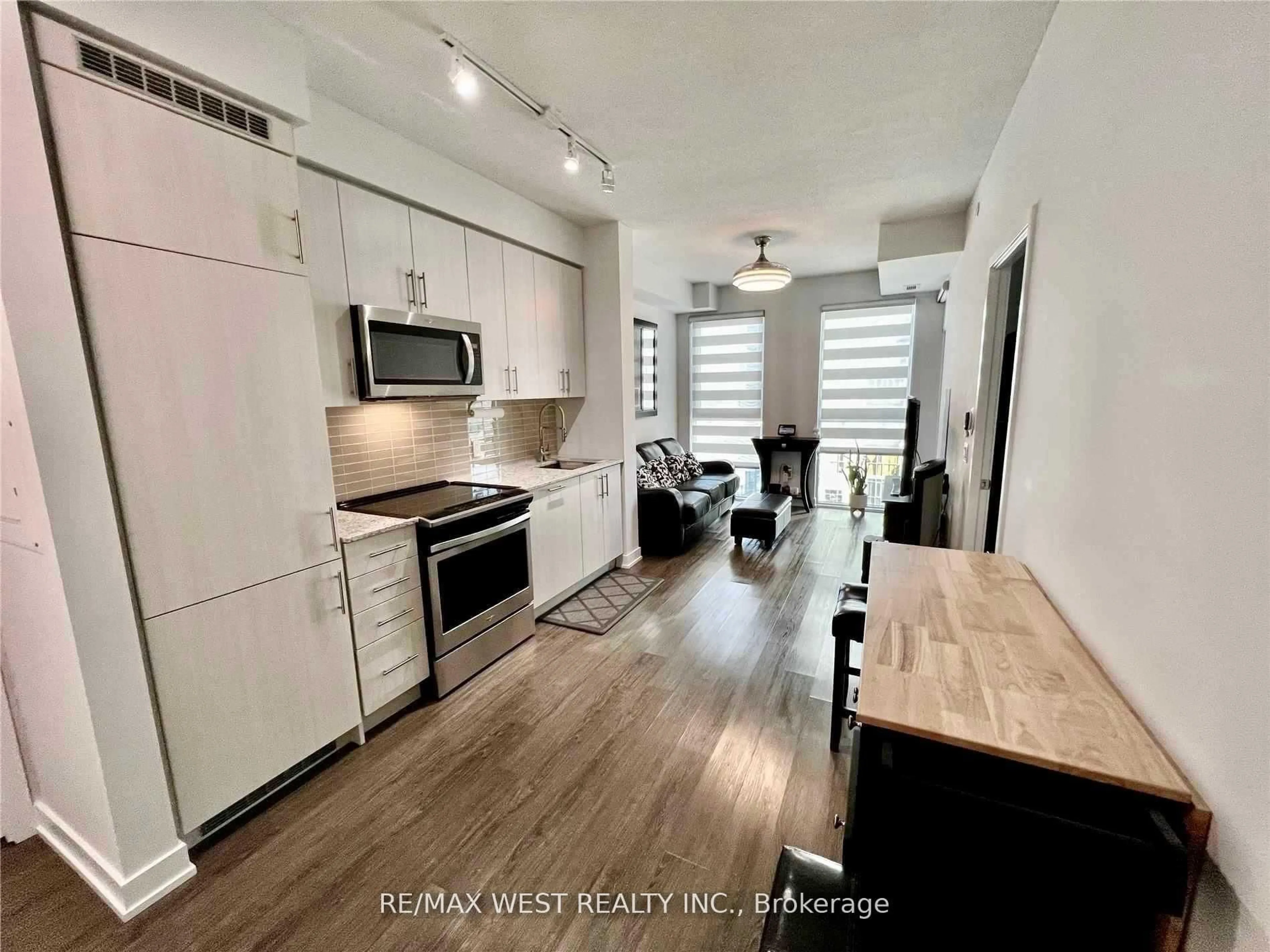 Open concept kitchen, wood/laminate floor for 4085 Parkside Village Dr #1606, Mississauga Ontario L5B 0K9
