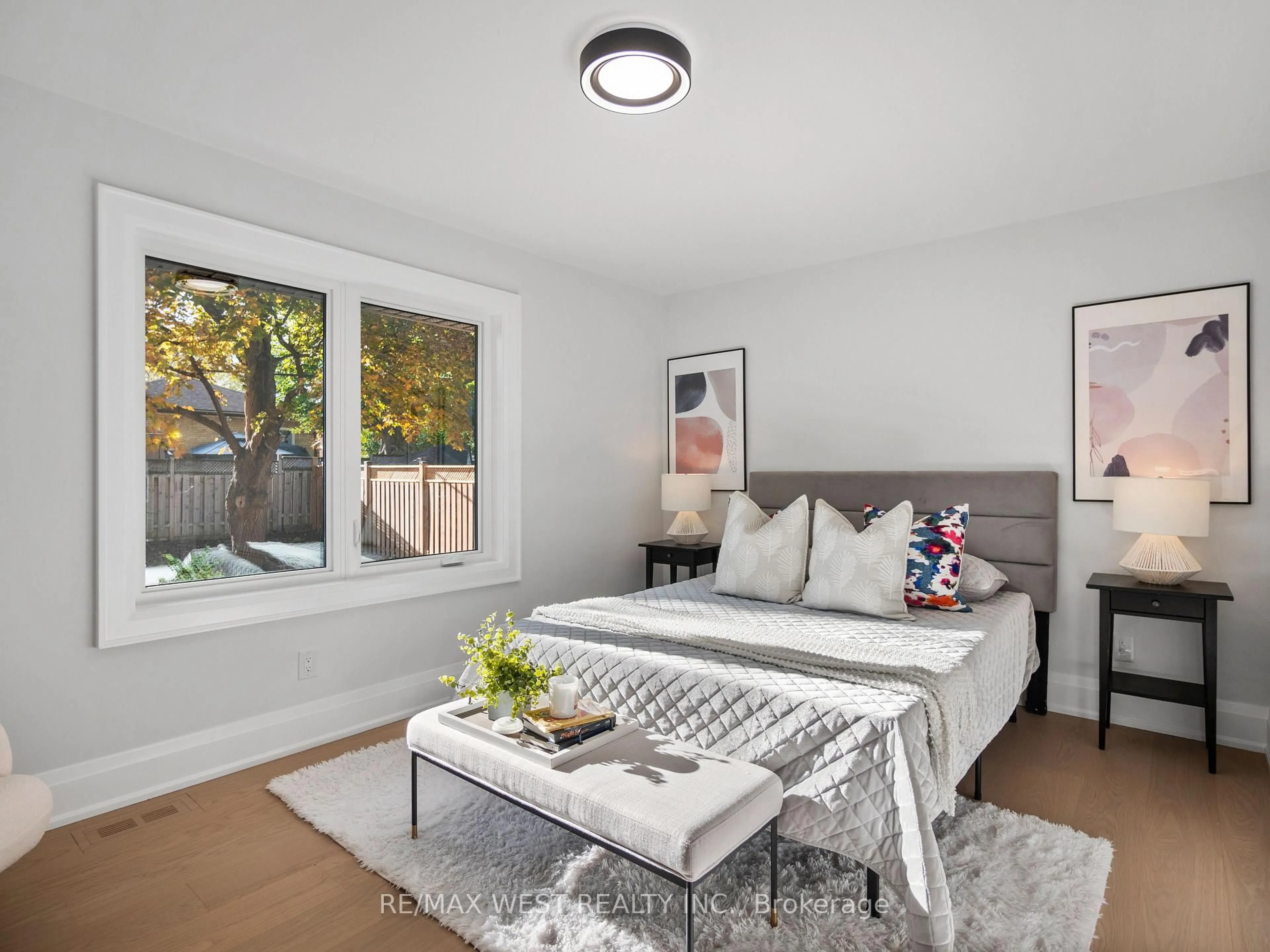 Bedroom with bed, wood/laminate floor for 24 Appledale Rd, Toronto Ontario M9B 5G4