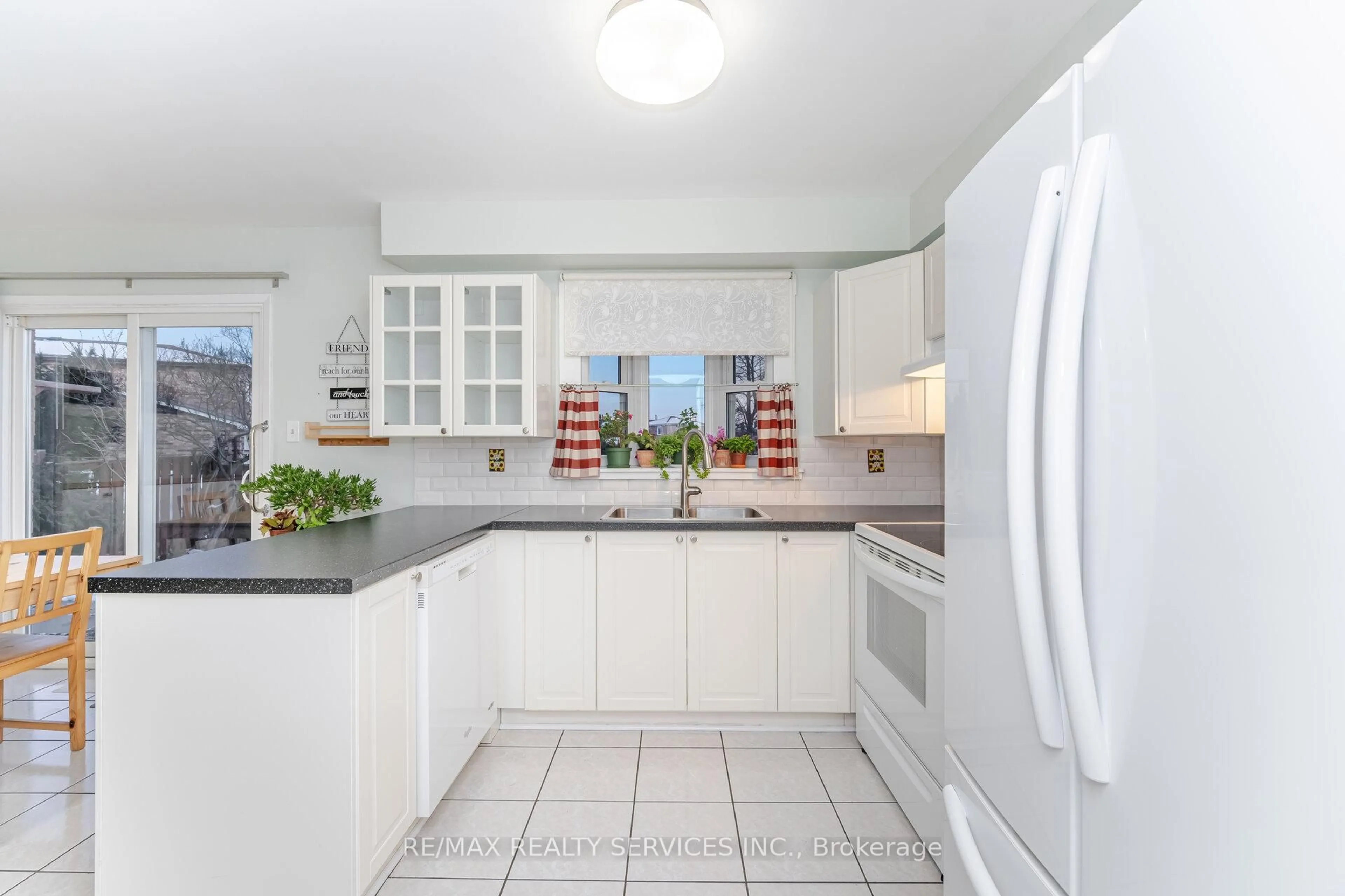 Standard kitchen, ceramic/tile floor for 93 Wildercroft Ave, Brampton Ontario L6V 4G6