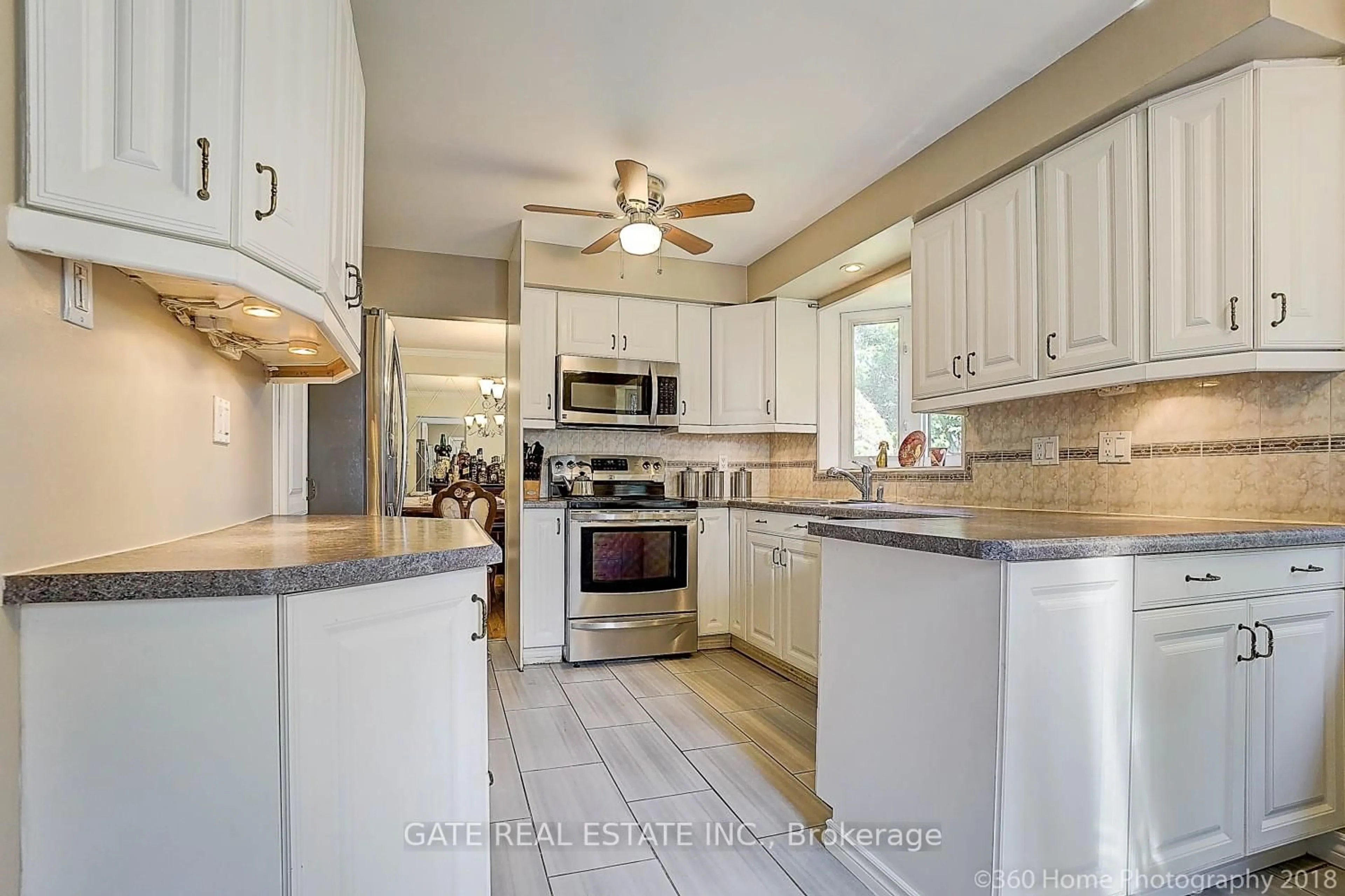 Open concept kitchen, ceramic/tile floor for 16 Massey St, Brampton Ontario L6S 2W1