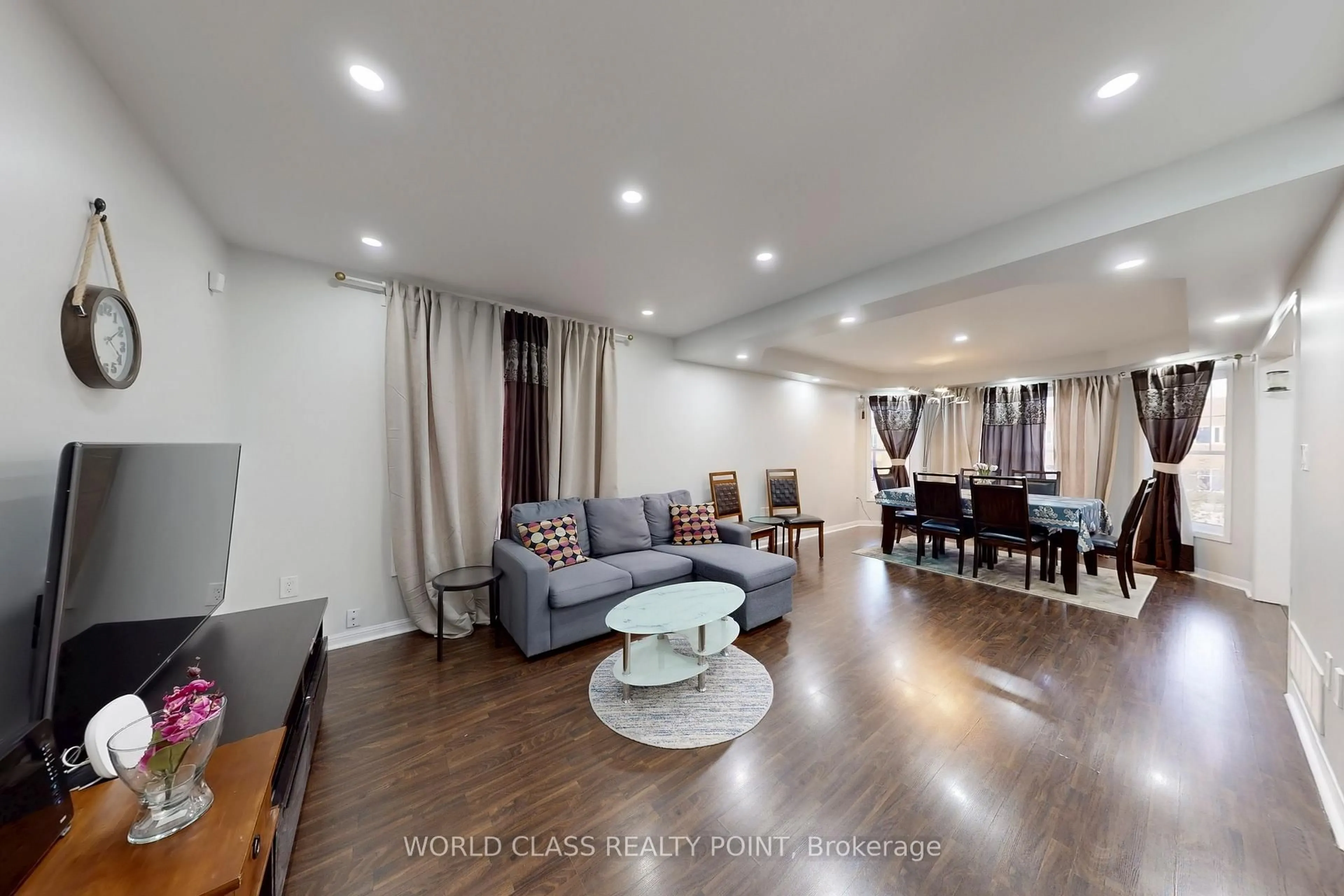 Living room with furniture, wood/laminate floor for 382 Pringle Ave, Milton Ontario L9T 7M4