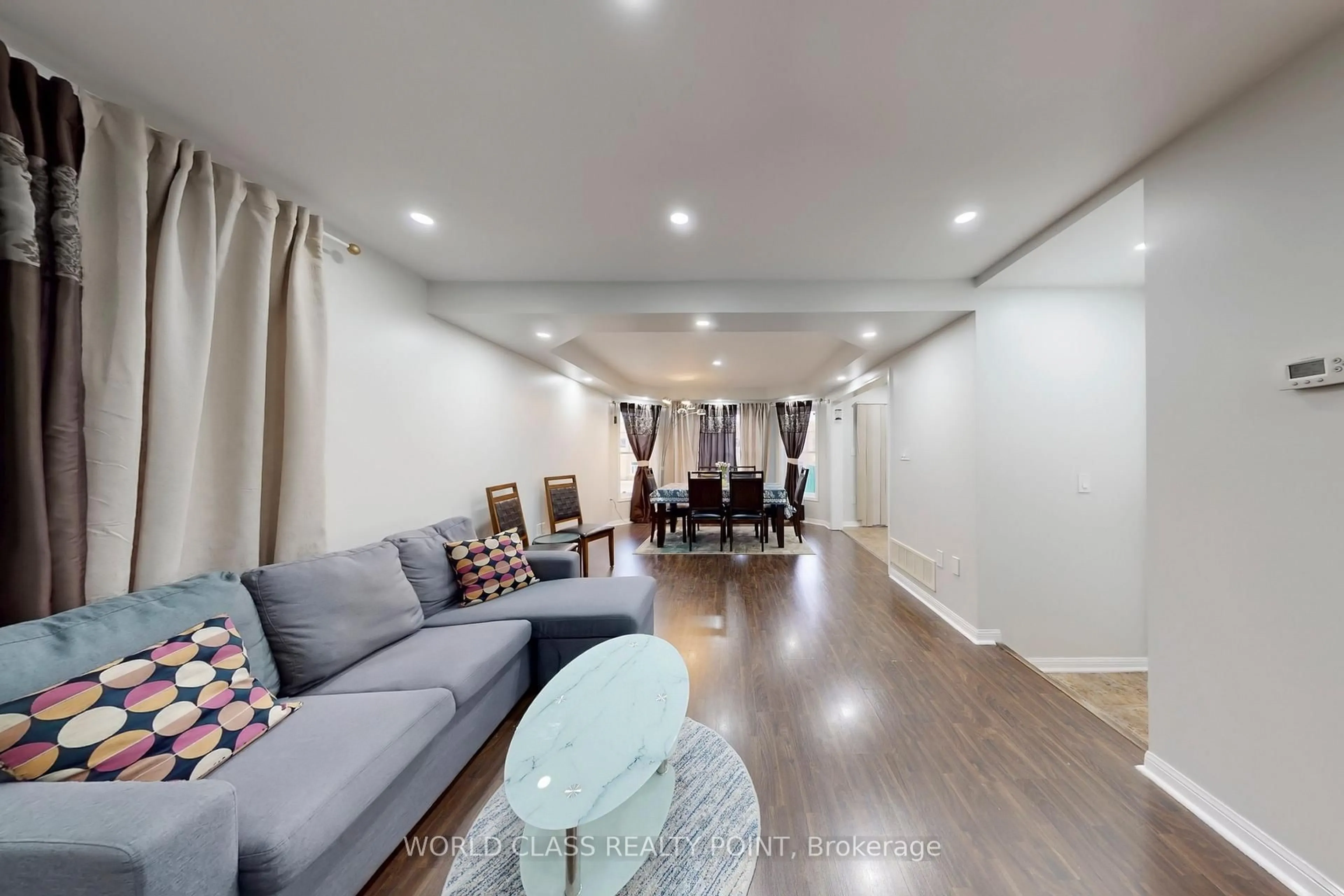 Living room with furniture, wood/laminate floor for 382 Pringle Ave, Milton Ontario L9T 7M4