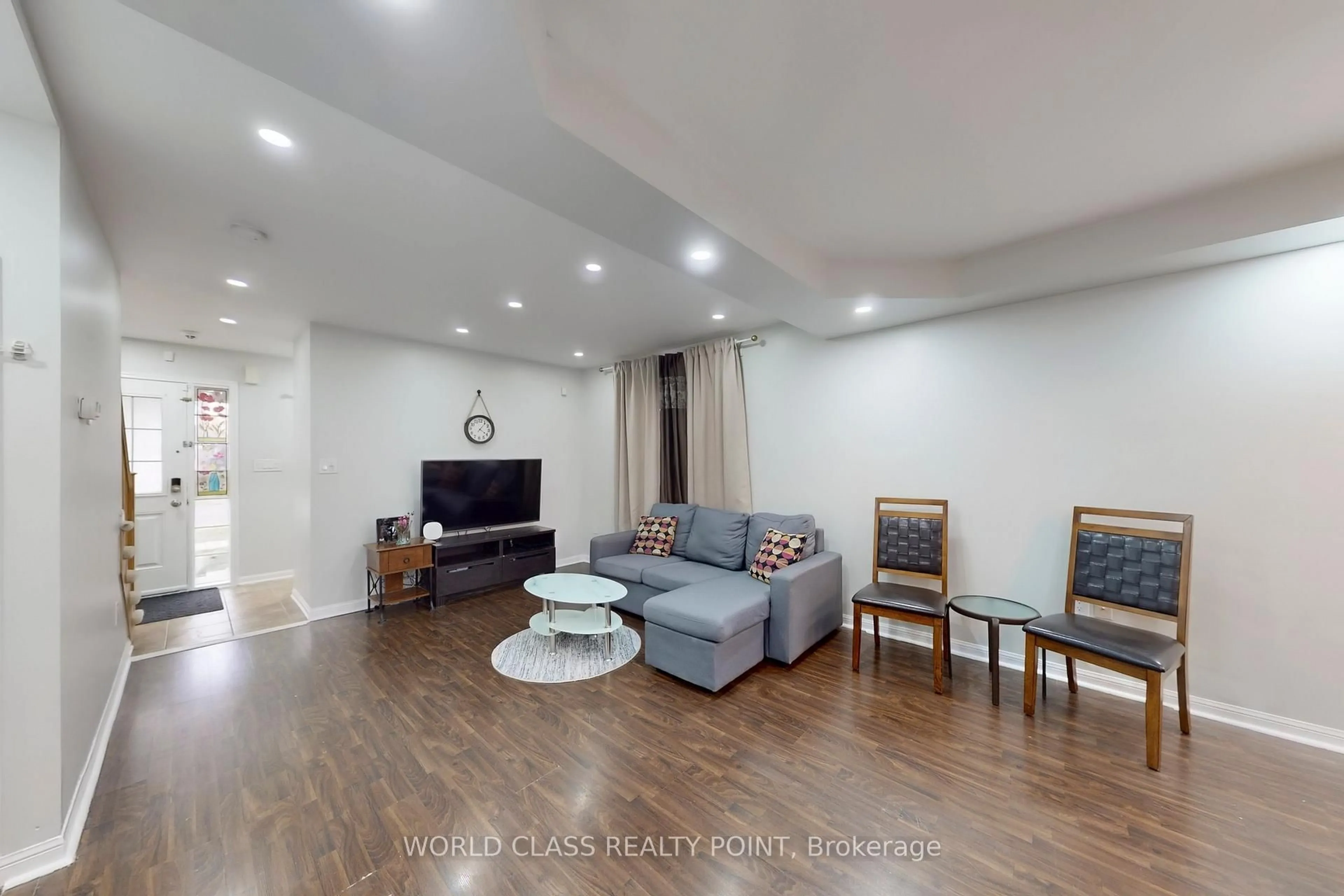 Living room with furniture, wood/laminate floor for 382 Pringle Ave, Milton Ontario L9T 7M4