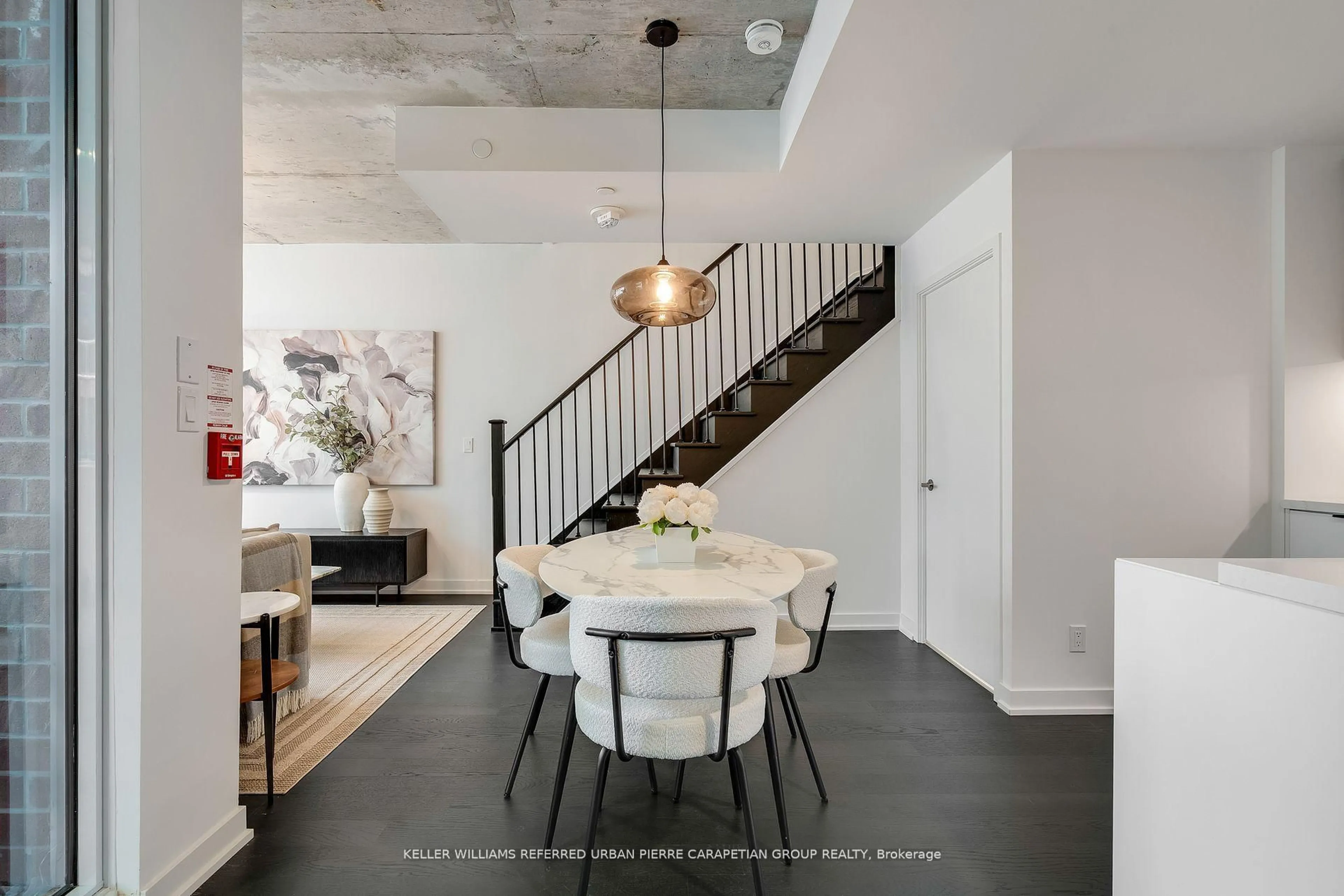 Dining room, cement floor for 57 Brock Ave #TH 109, Toronto Ontario M6K 0H3