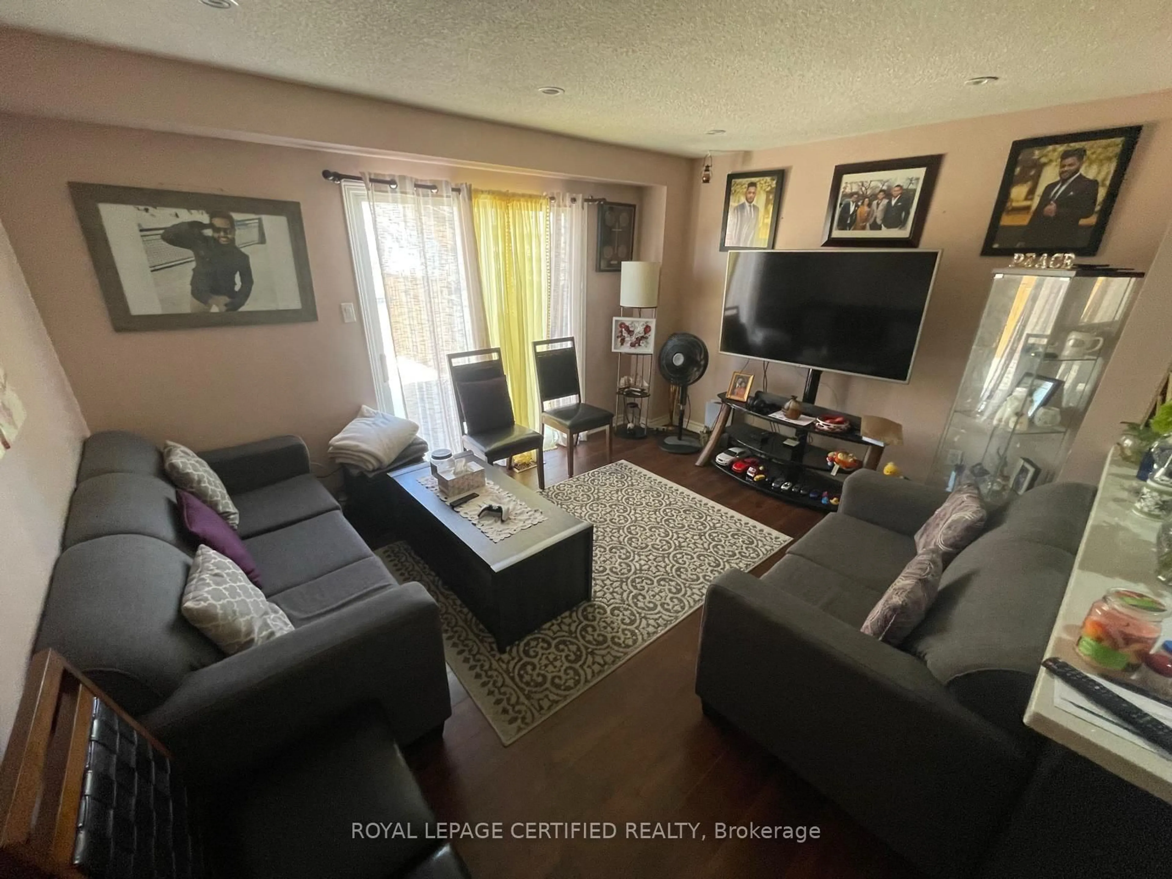 Living room with furniture, unknown for 42 Wooliston Cres, Brampton Ontario L6Y 4J5