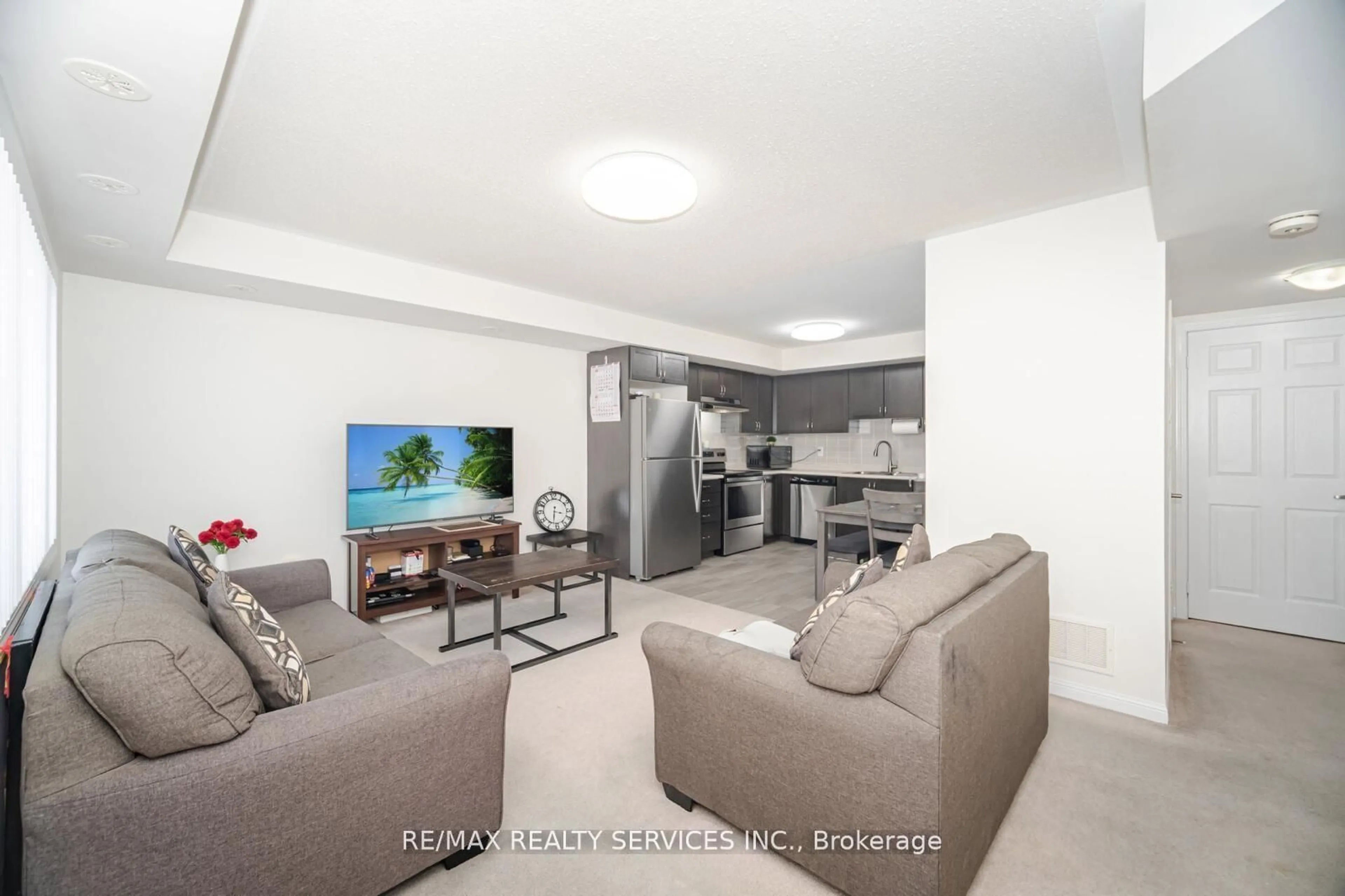 Living room with furniture, unknown for 250 Sunny Meadow Blvd #320, Brampton Ontario L6R 3Y7