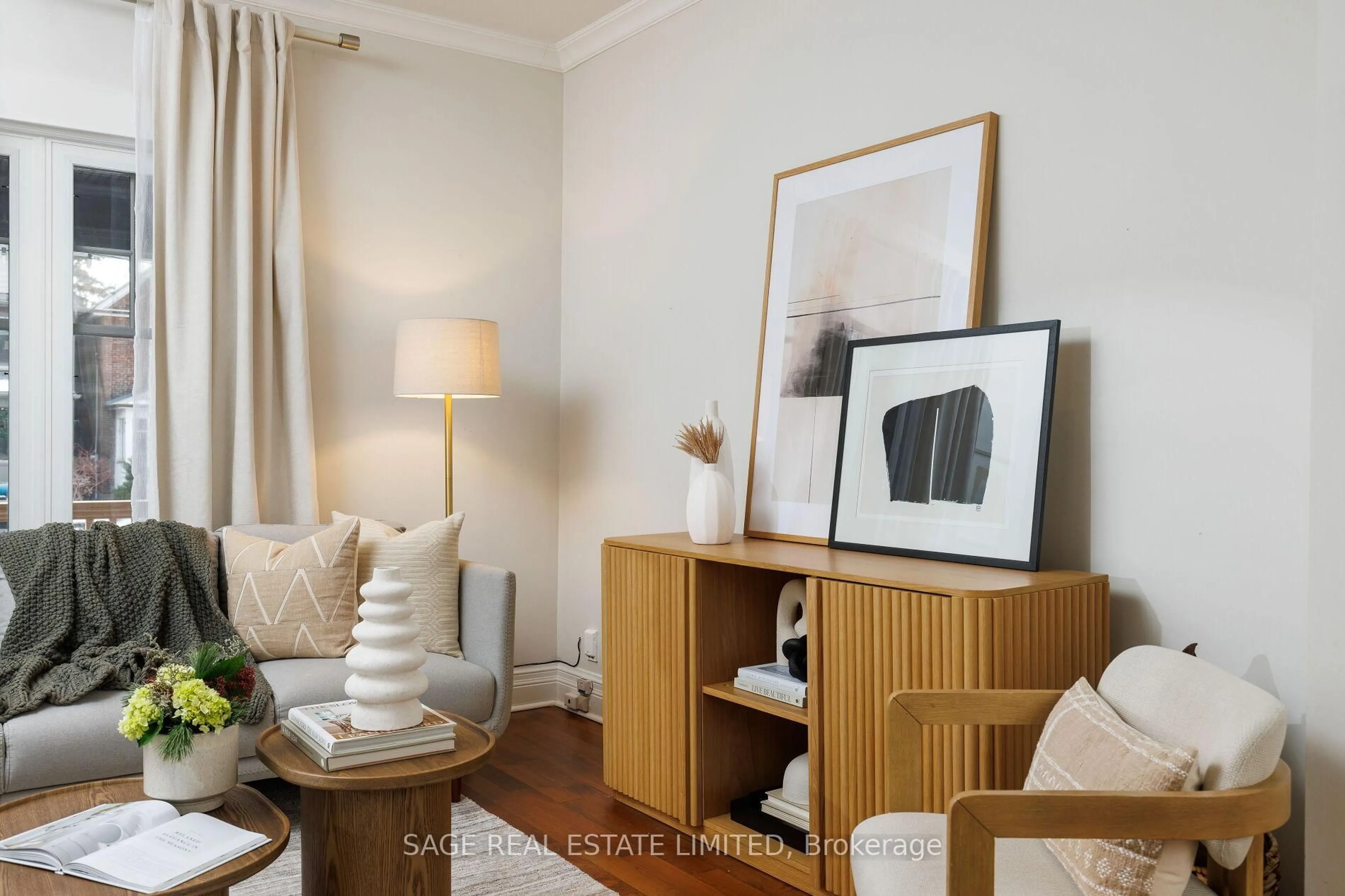 Living room with furniture, wood/laminate floor for 277 Evelyn Ave, Toronto Ontario M6P 2Z8