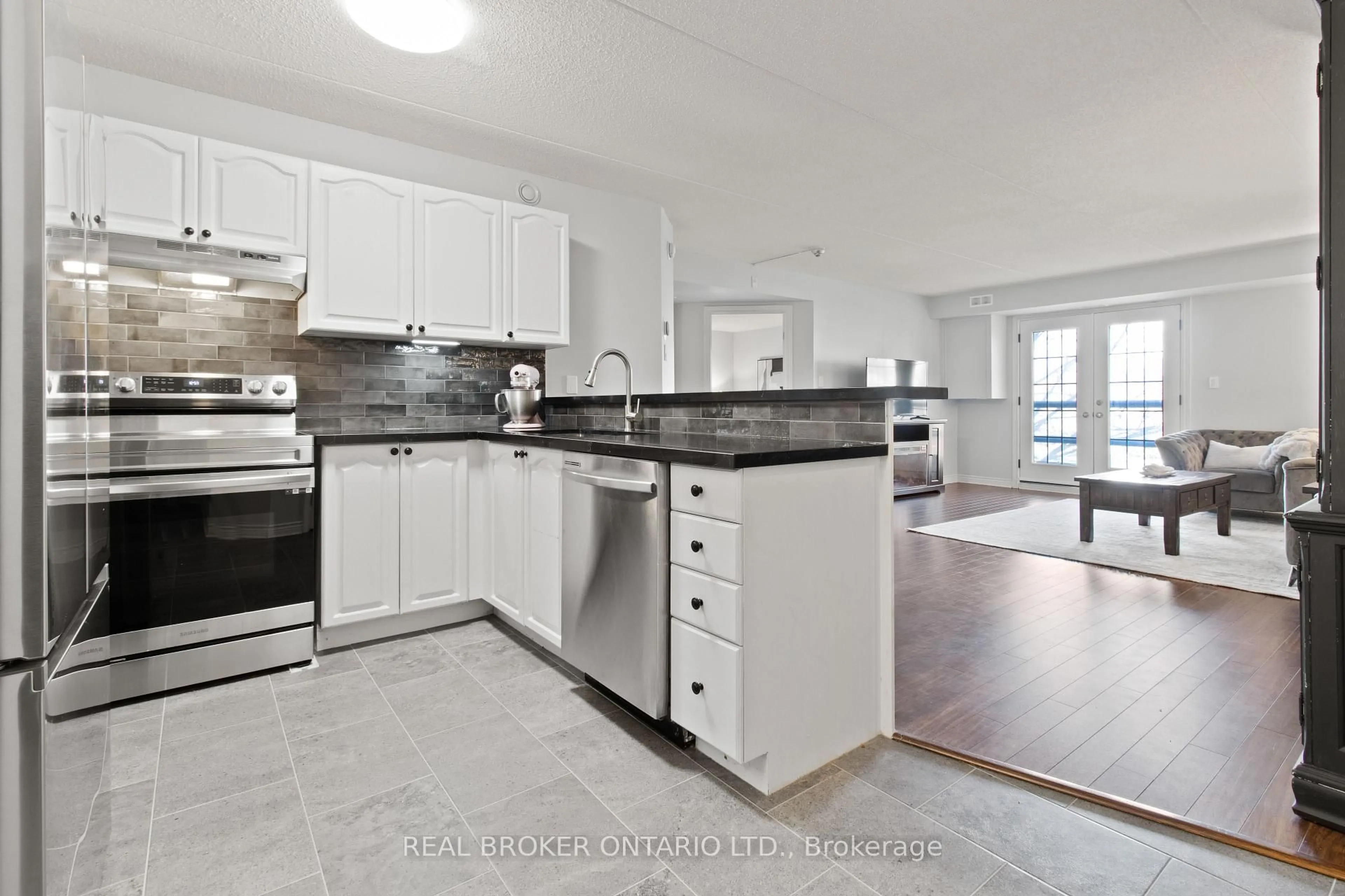 Open concept kitchen, ceramic/tile floor for 2010 Cleaver Ave #214, Burlington Ontario L7M 4C1