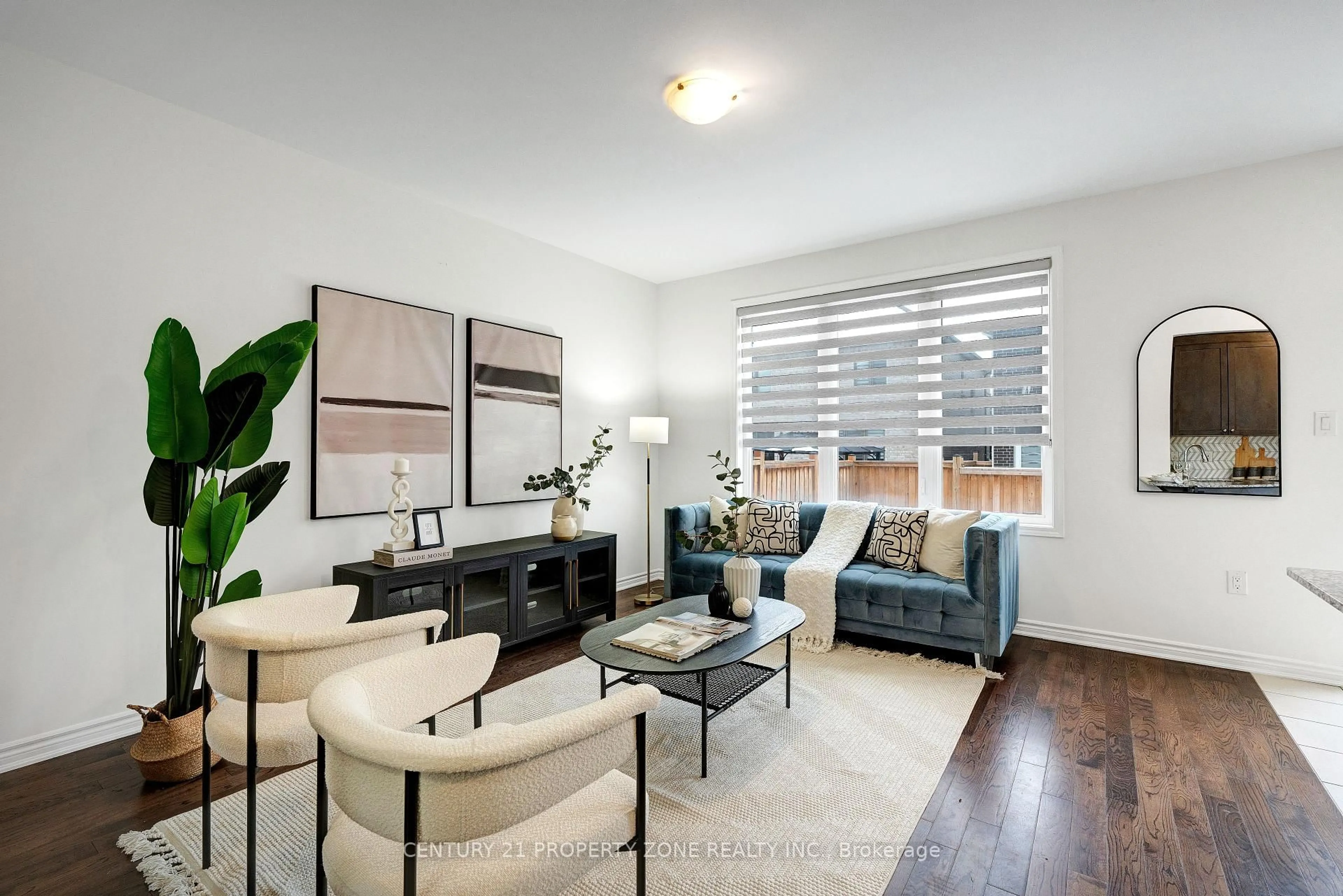 Living room with furniture, wood/laminate floor for 13 Boothill Dr, Brampton Ontario L7A 0A9