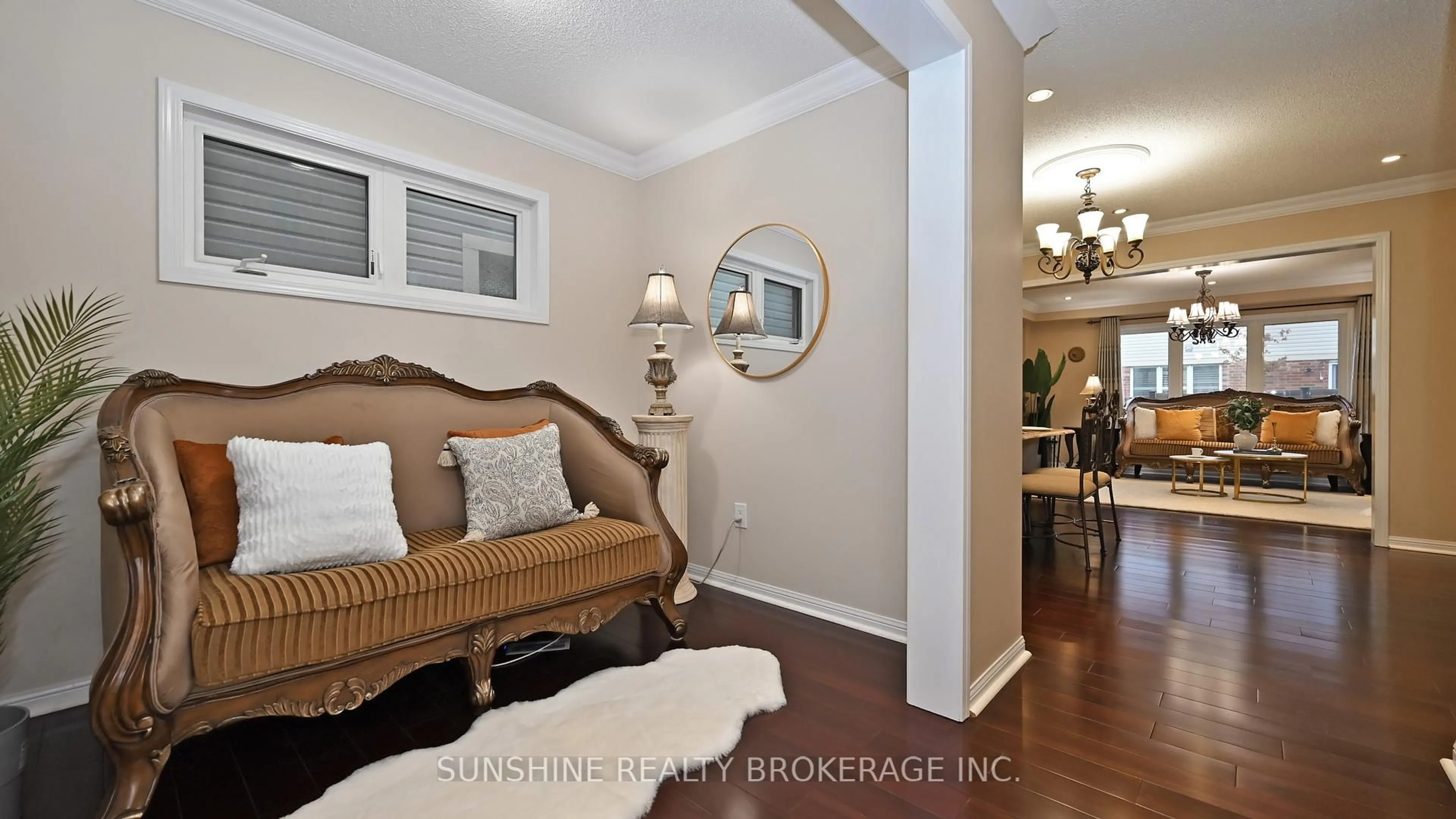 Living room with furniture, wood/laminate floor for 211 Monaghan Cres, Milton Ontario L9T 8C7