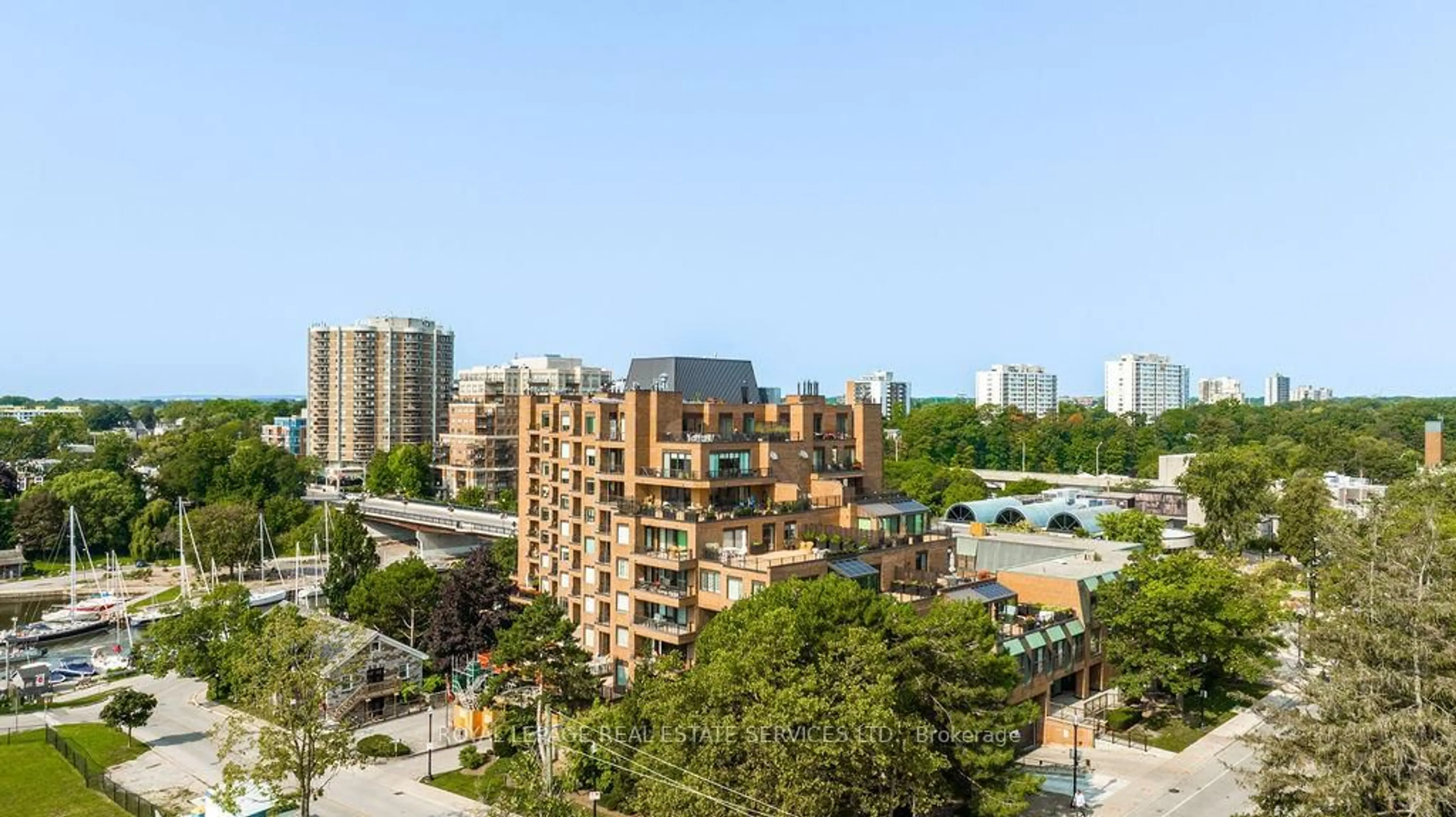 A pic from outside/outdoor area/front of a property/back of a property/a pic from drone, city buildings view from balcony for 100 Lakeshore Rd #708, Oakville Ontario L6J 6M9