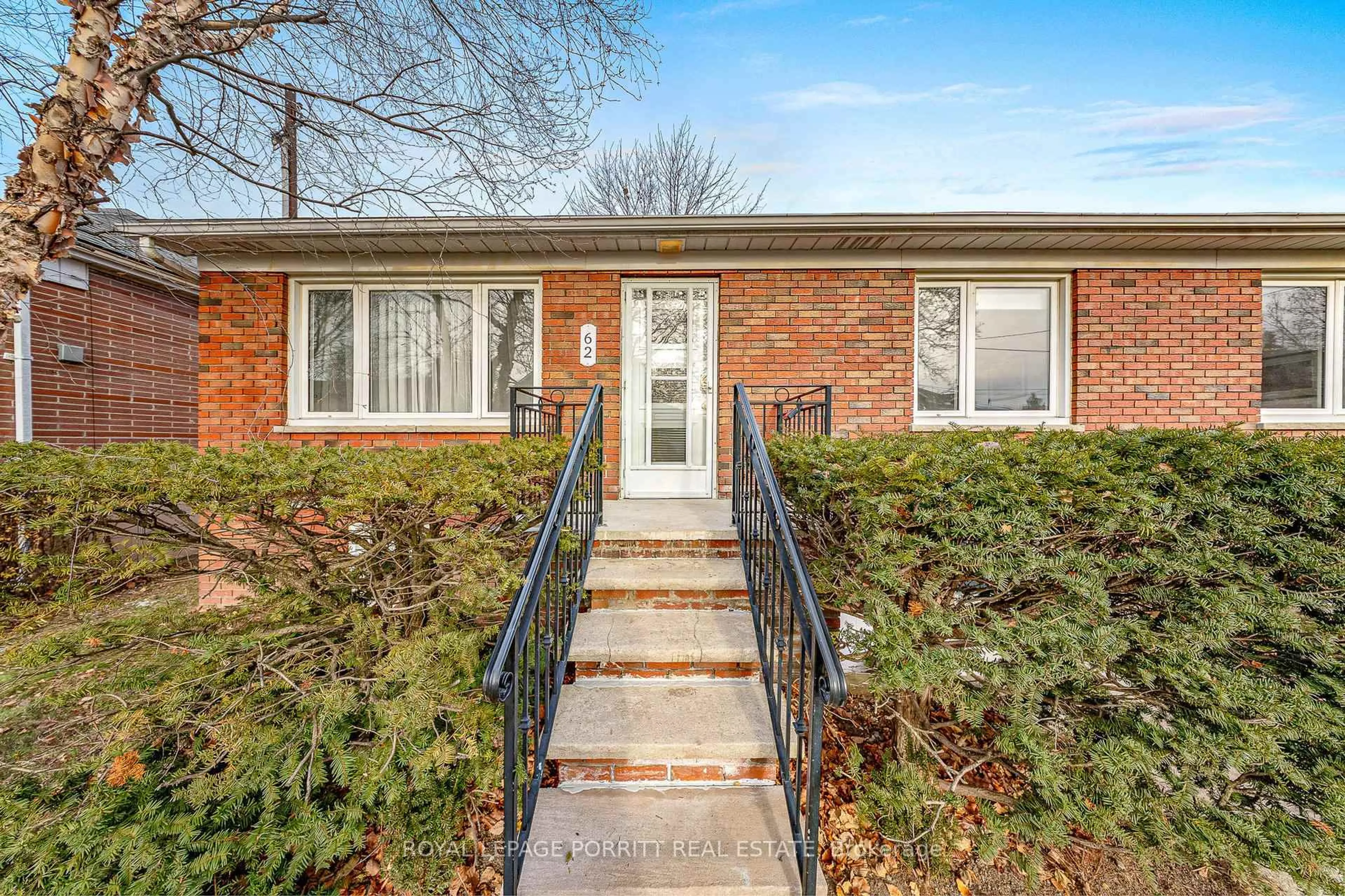 Home with brick exterior material, street for 62 Fairfield Ave, Toronto Ontario M8W 1R8