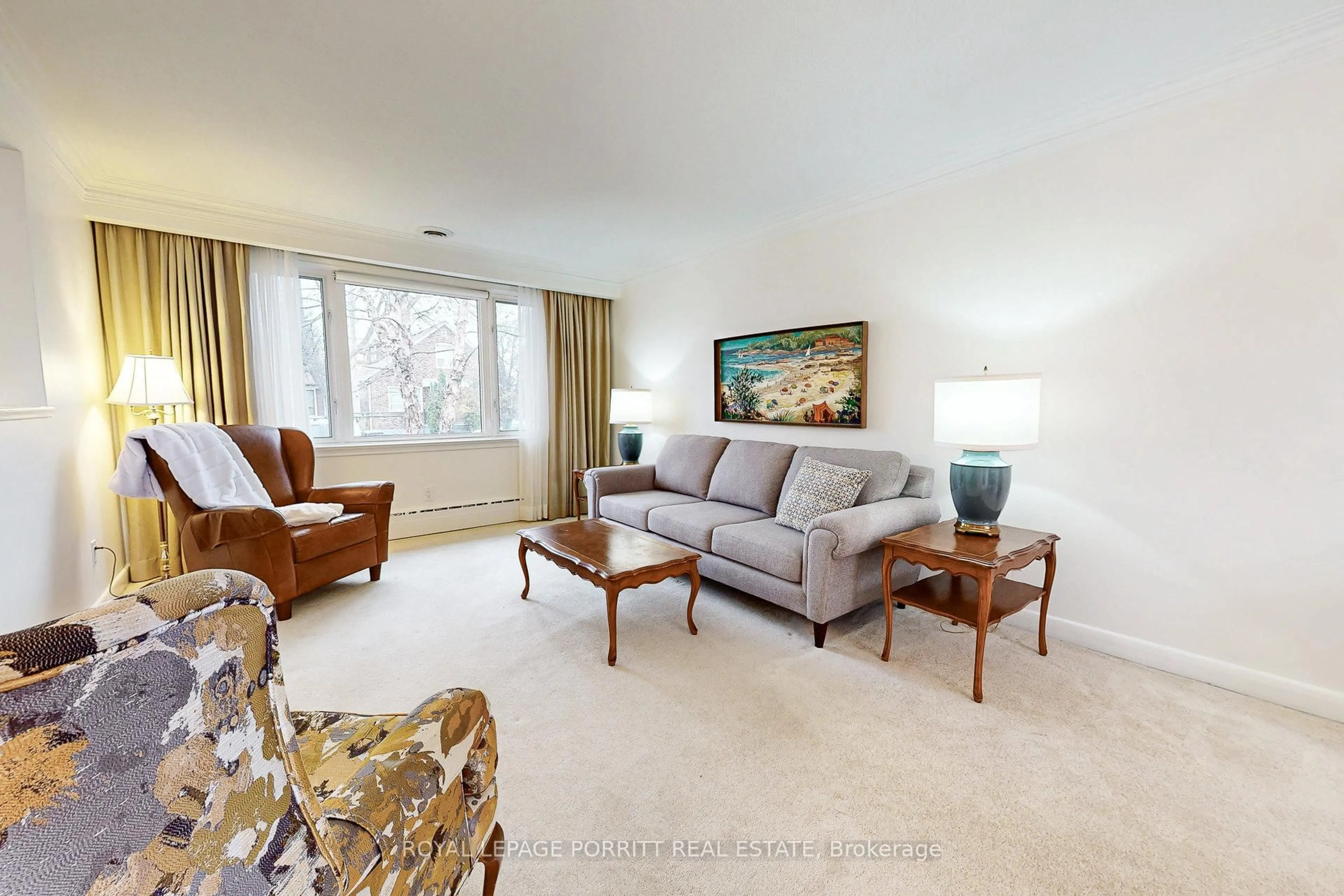 Living room with furniture, carpet floor for 62 Fairfield Ave, Toronto Ontario M8W 1R8