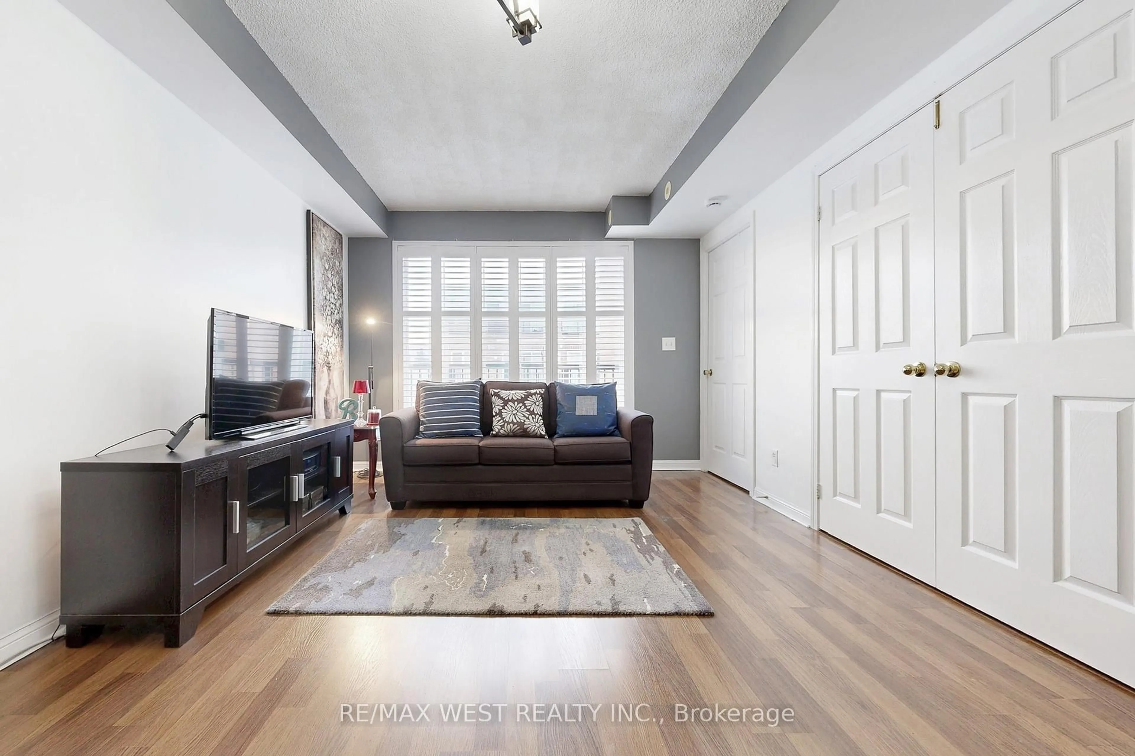 Living room with furniture, unknown for 3043 Finch Ave #2046, Toronto Ontario M9M 0A4