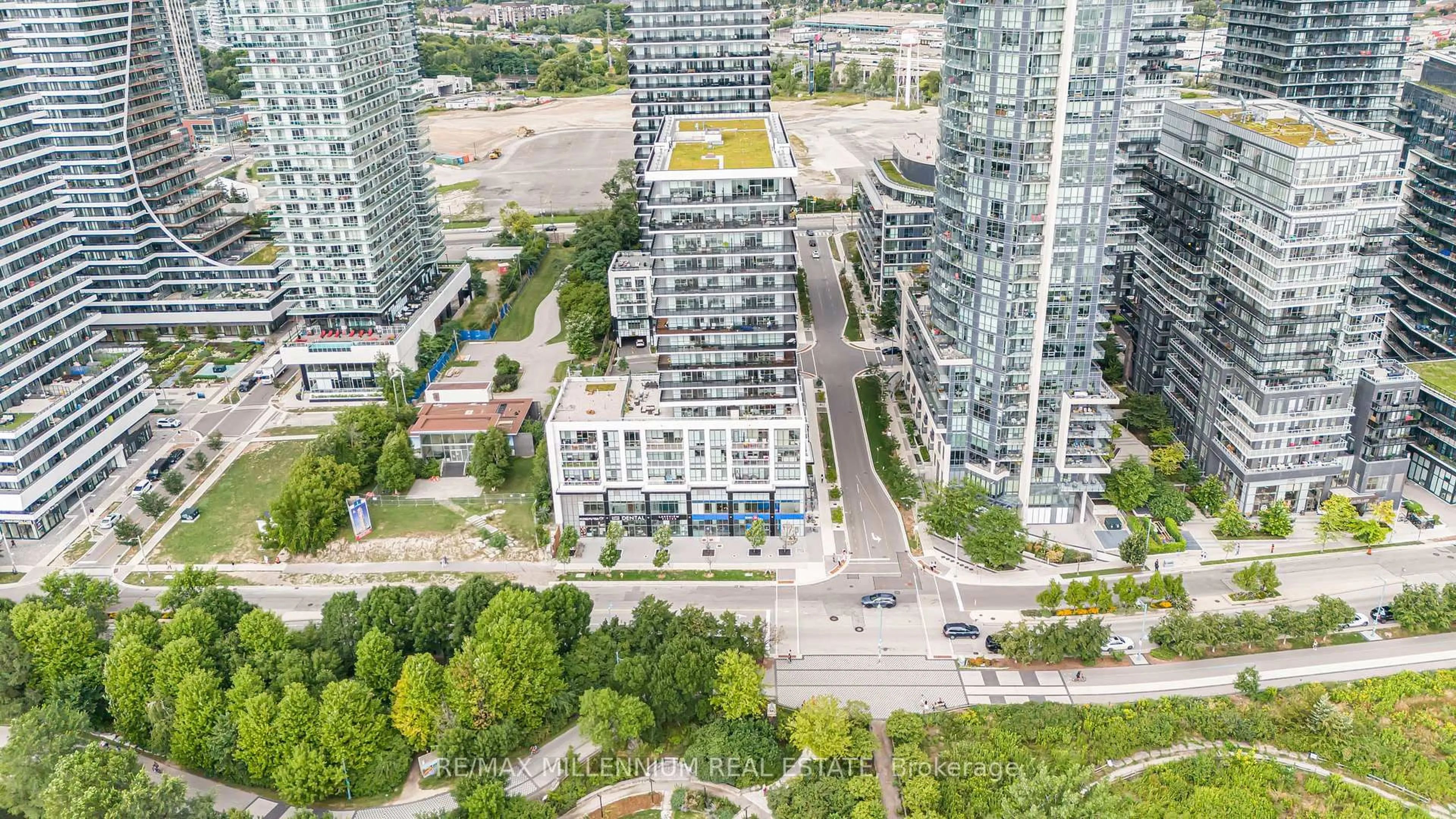 A pic from outside/outdoor area/front of a property/back of a property/a pic from drone, city buildings view from balcony for 65 Annie Craig Dr #316, Toronto Ontario M8V 0C4