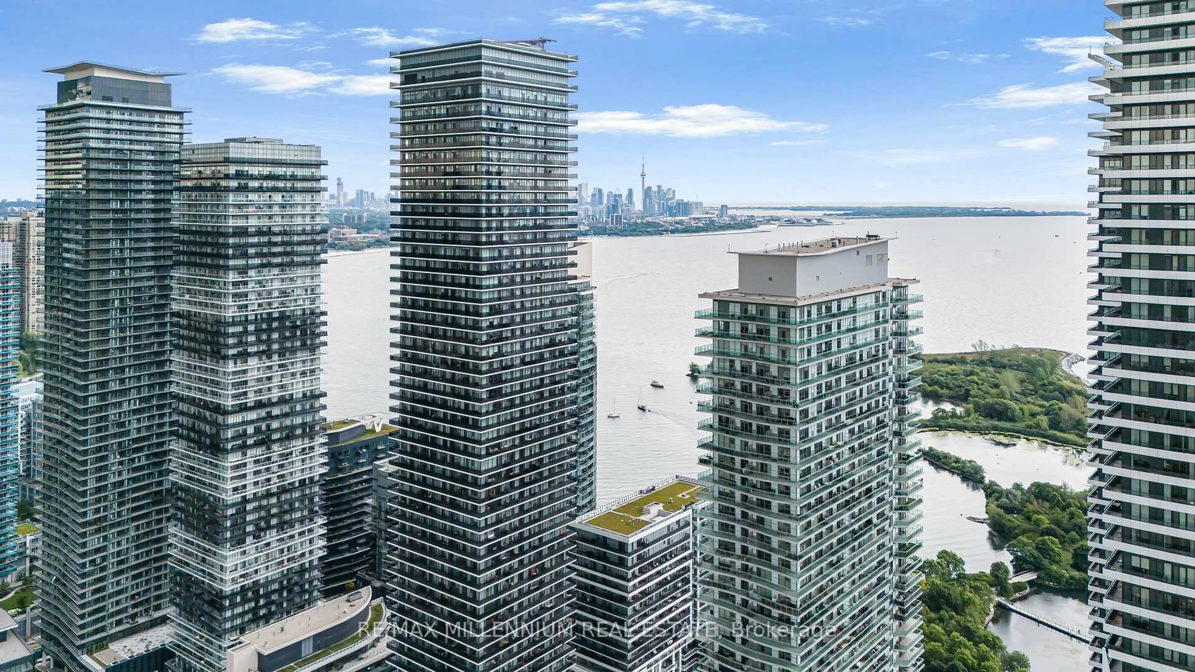 A pic from outside/outdoor area/front of a property/back of a property/a pic from drone, city buildings view from balcony for 65 Annie Craig Dr #316, Toronto Ontario M8V 0C4