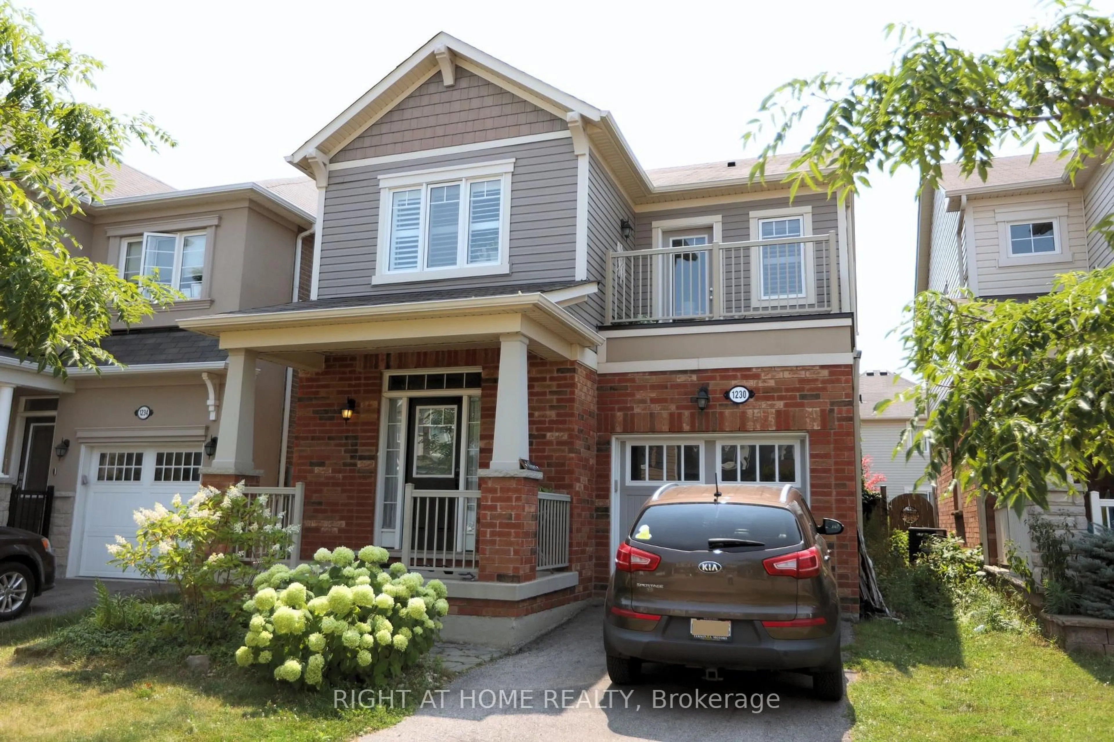 Home with brick exterior material, street for 1230 Biason Circ, Milton Ontario L9T 8S8