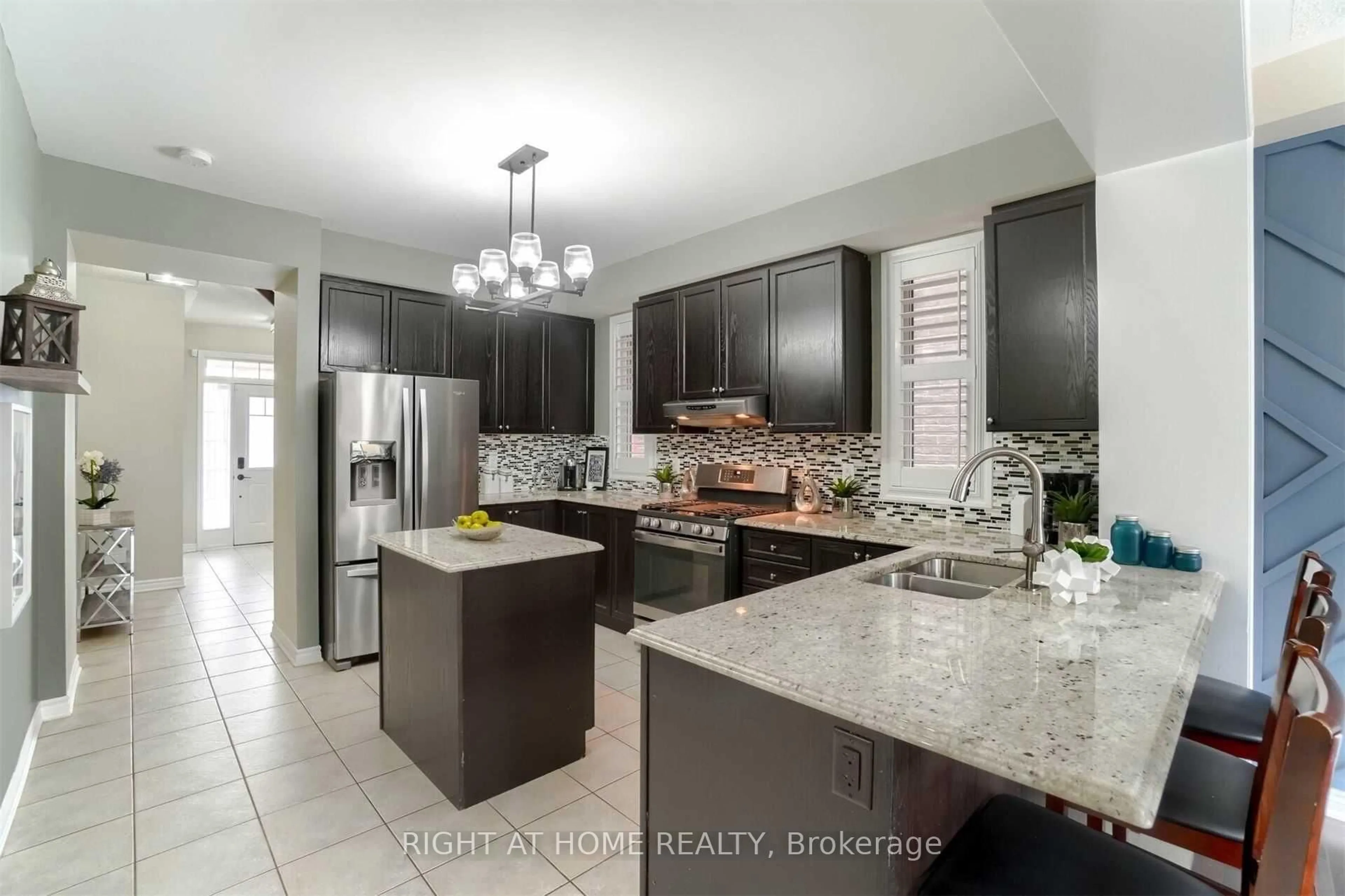 Open concept kitchen, ceramic/tile floor for 1230 Biason Circ, Milton Ontario L9T 8S8