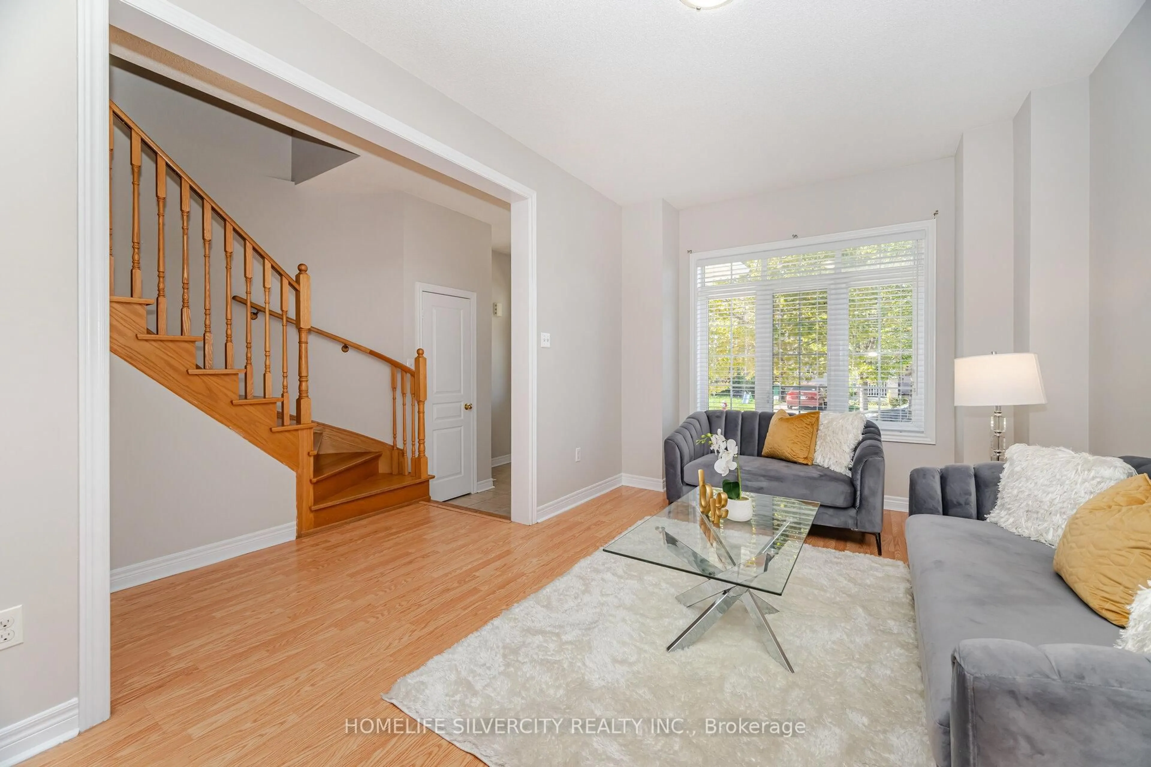 Living room with furniture, unknown for 105 Aylesbury Dr, Brampton Ontario L7A 0W6