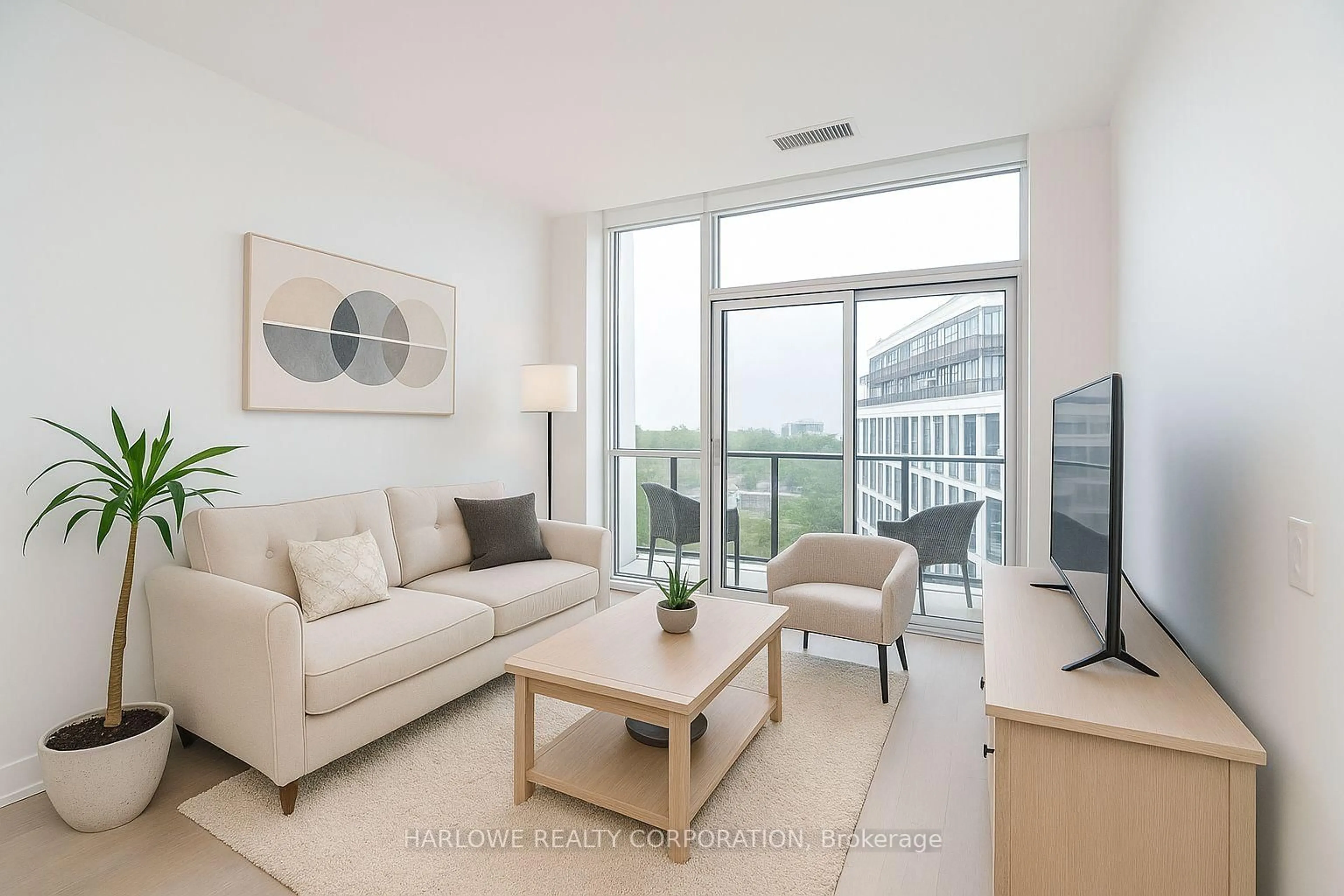 Living room with furniture, unknown for 60 George Butchart Dr #717, Toronto Ontario M3K 0E1