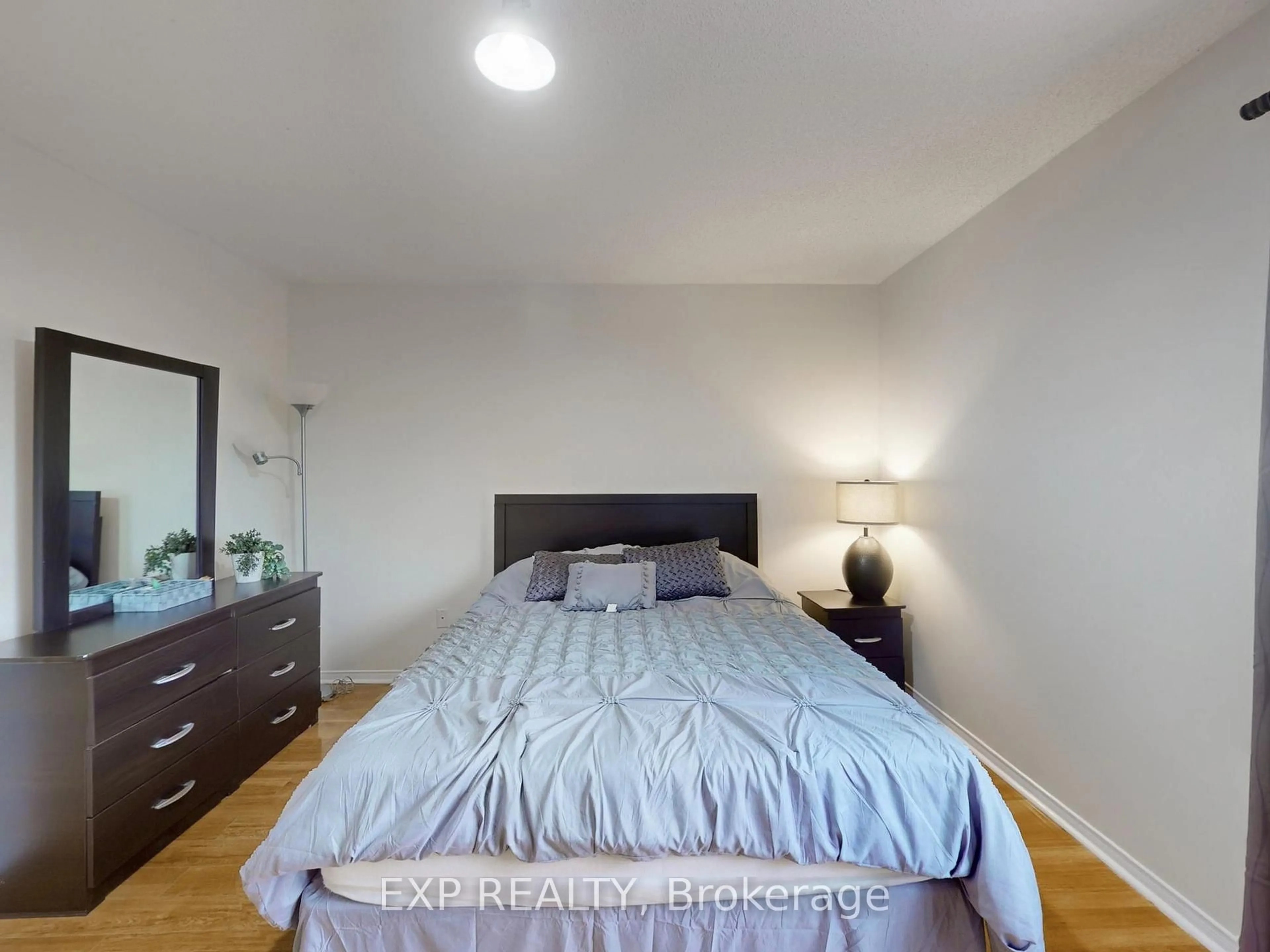 Bedroom with bed, wood/laminate floor for 3896 Lacman Tr, Mississauga Ontario L5M 6N8