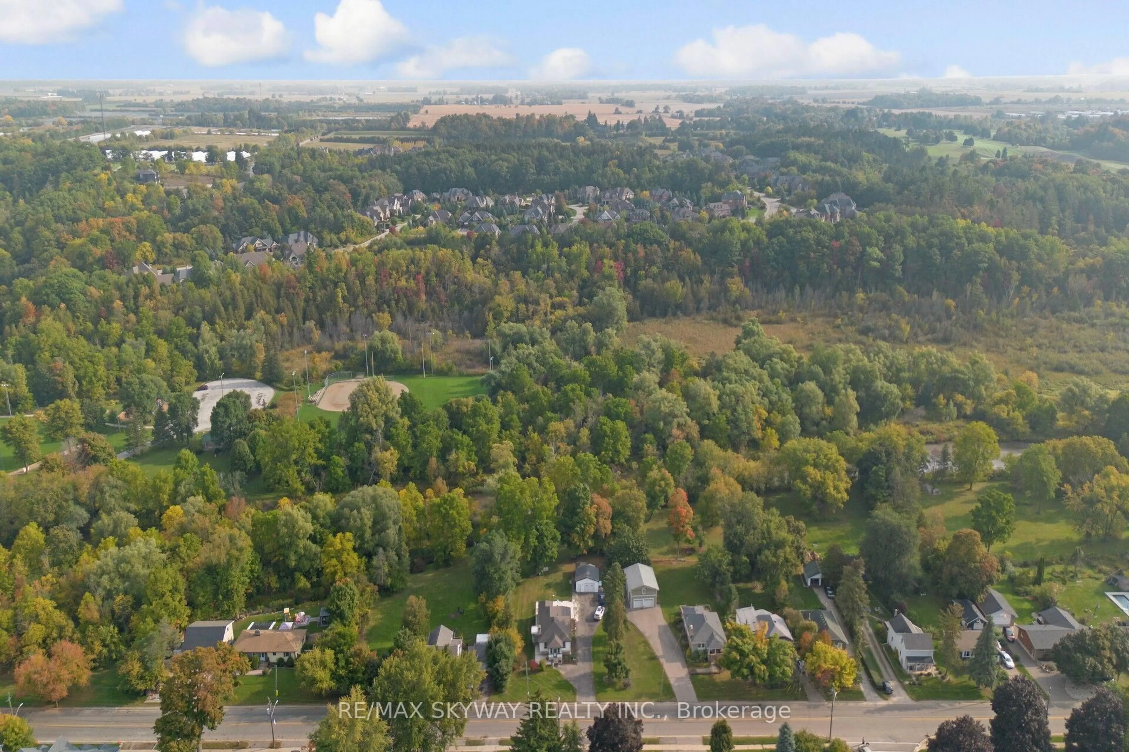 A pic from outside/outdoor area/front of a property/back of a property/a pic from drone, forest/trees view for 45 Confederation St, Halton Hills Ontario L7G 3R4