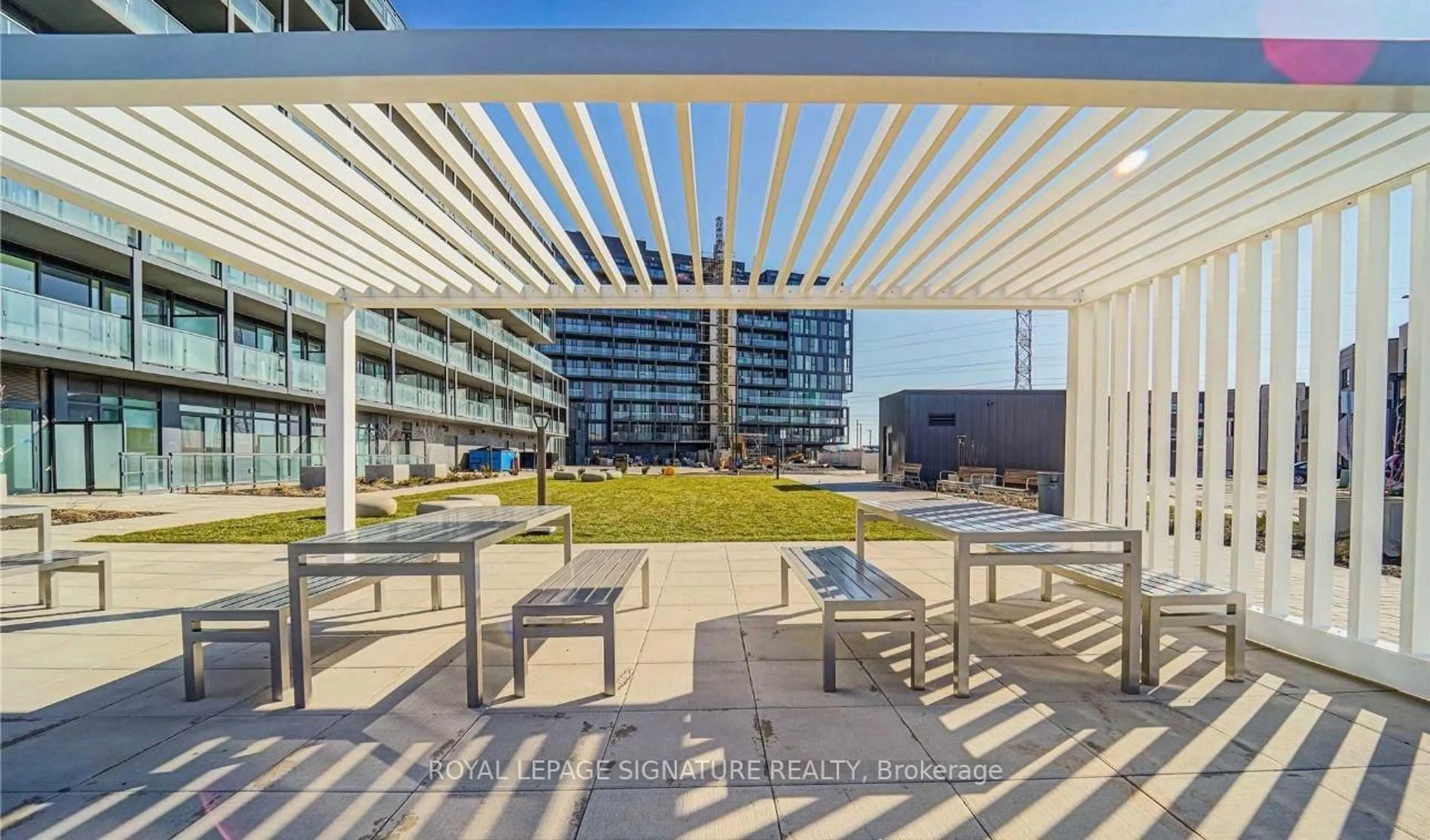 Patio, city buildings view from balcony for 3200 Dakota Common #B520, Burlington Ontario L7M 2A7