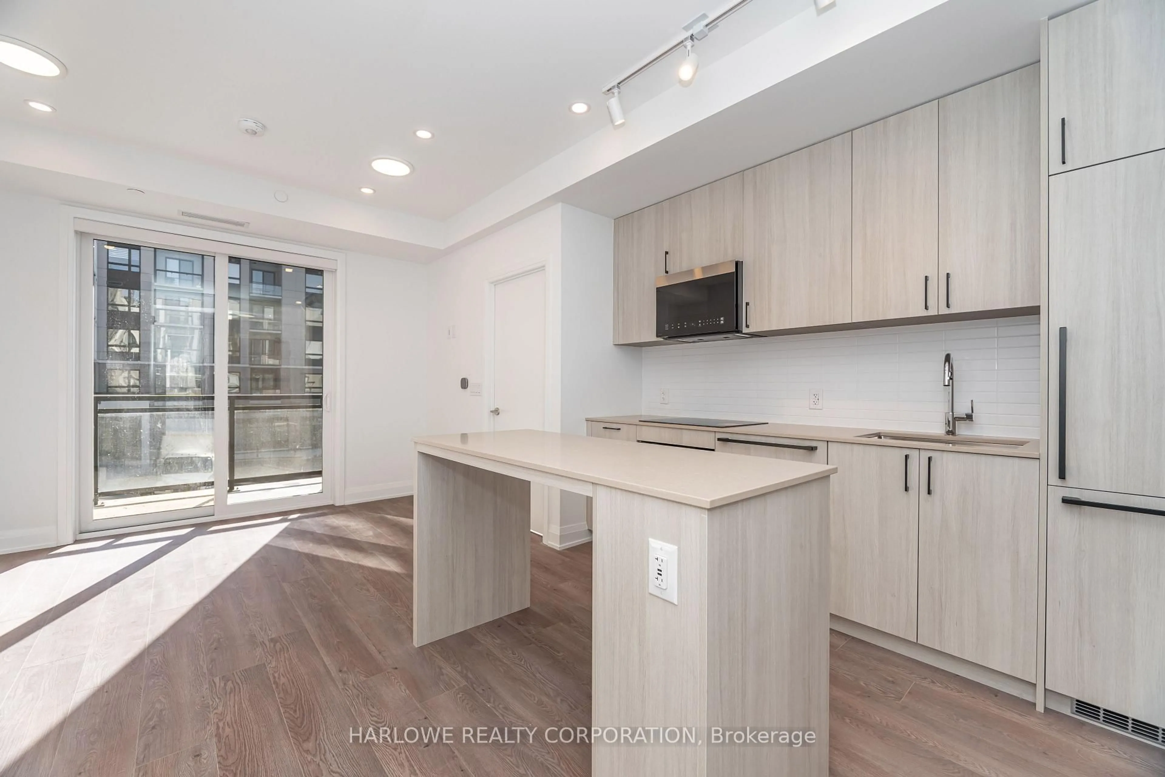 Open concept kitchen, unknown for 3250 Carding Mill Tr #208, Oakville Ontario L6M 1L3