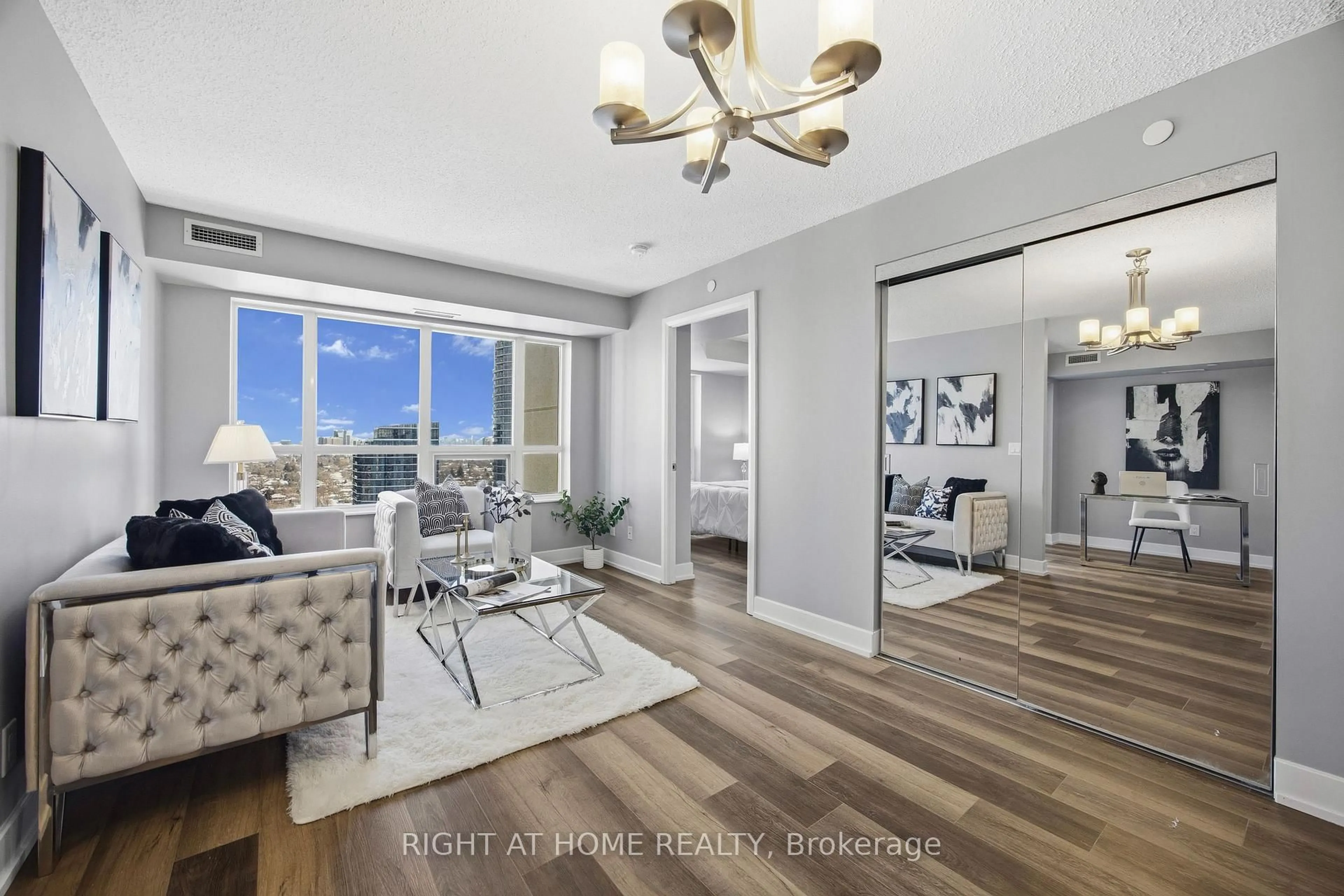 Living room with furniture, unknown for 6 Eva Rd #2103, Toronto Ontario M9C 0B1