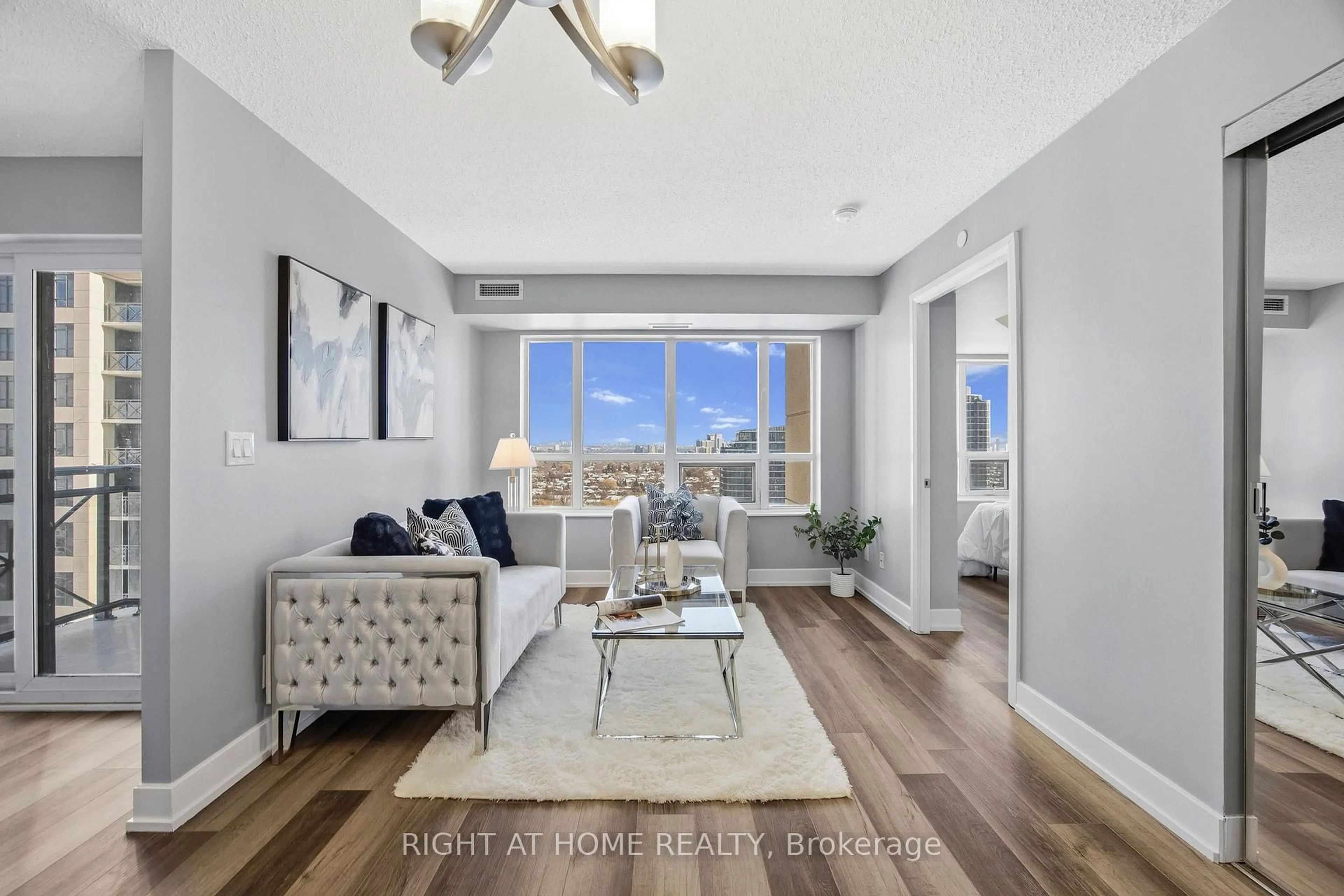 Living room with furniture, unknown for 6 Eva Rd #2103, Toronto Ontario M9C 0B1