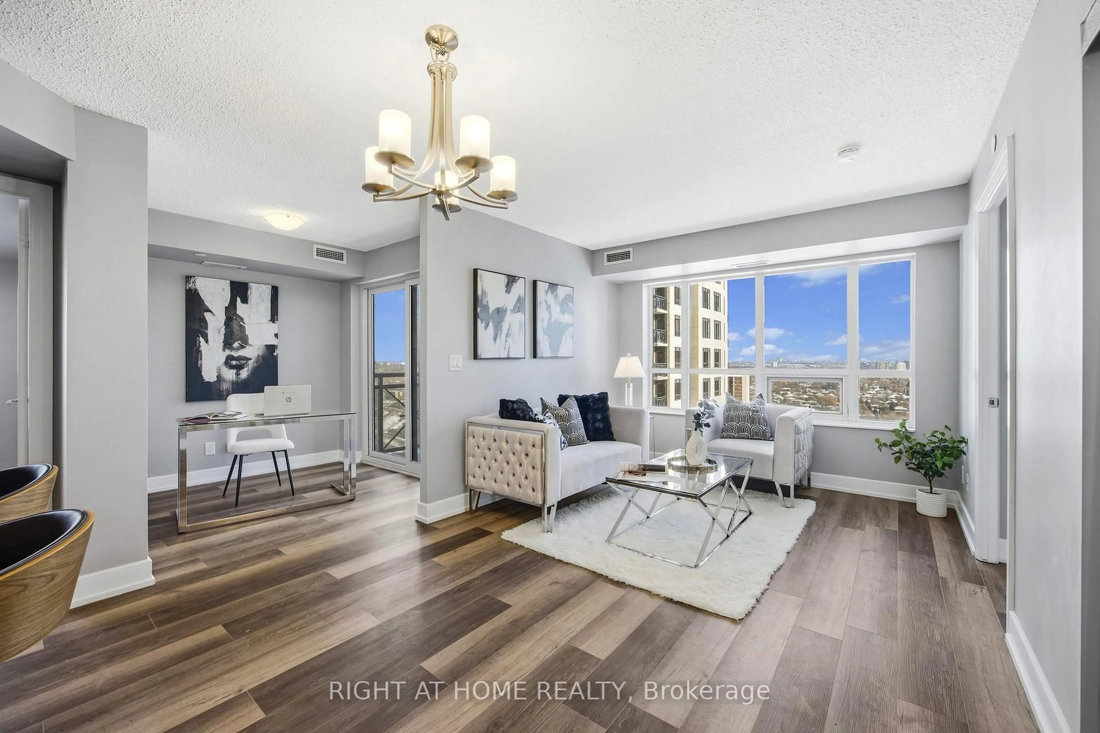 Living room with furniture, unknown for 6 Eva Rd #2103, Toronto Ontario M9C 0B1