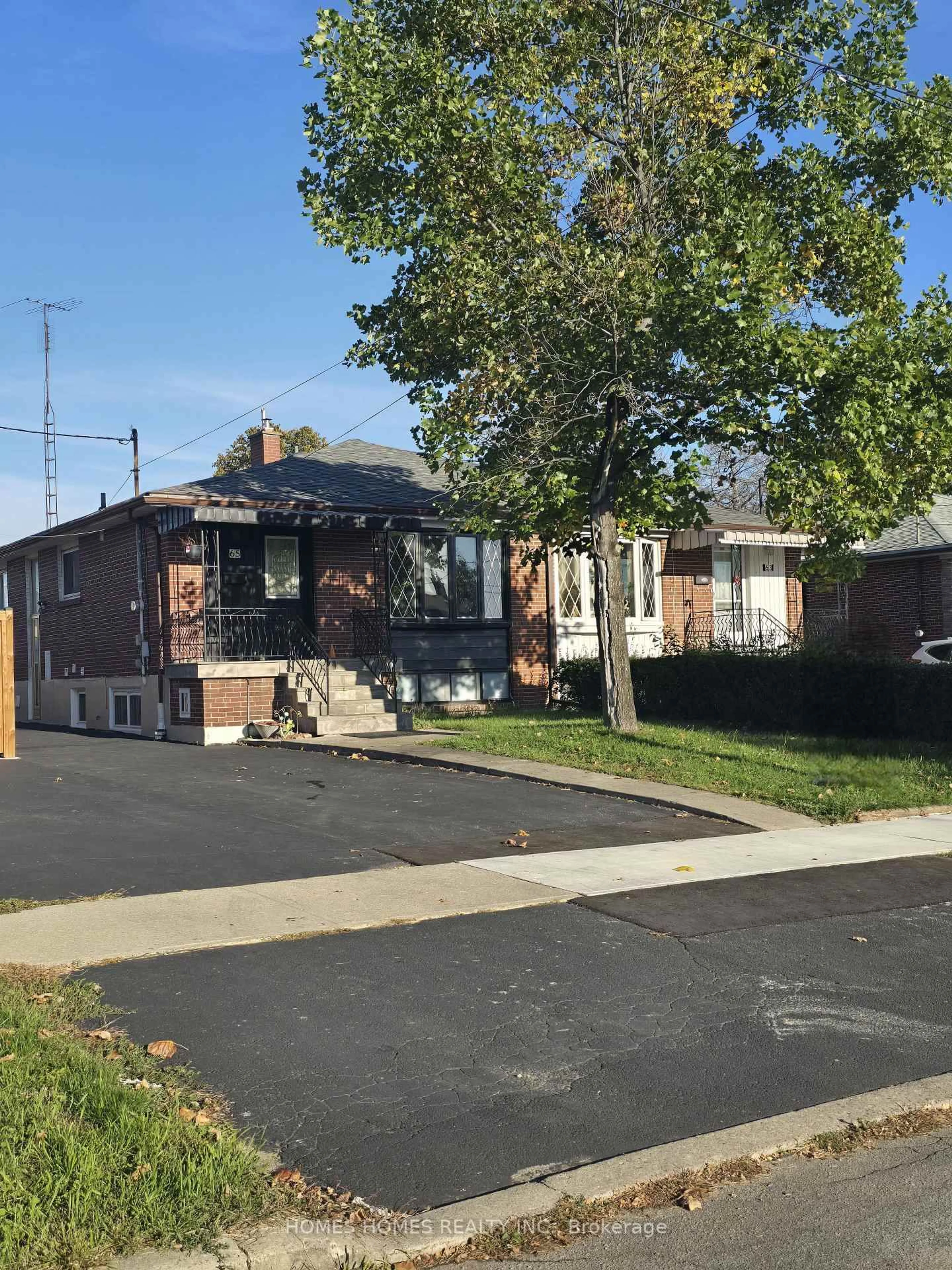 Home with brick exterior material, street for 65 Elnathan Cres, Toronto Ontario M9L 2G2