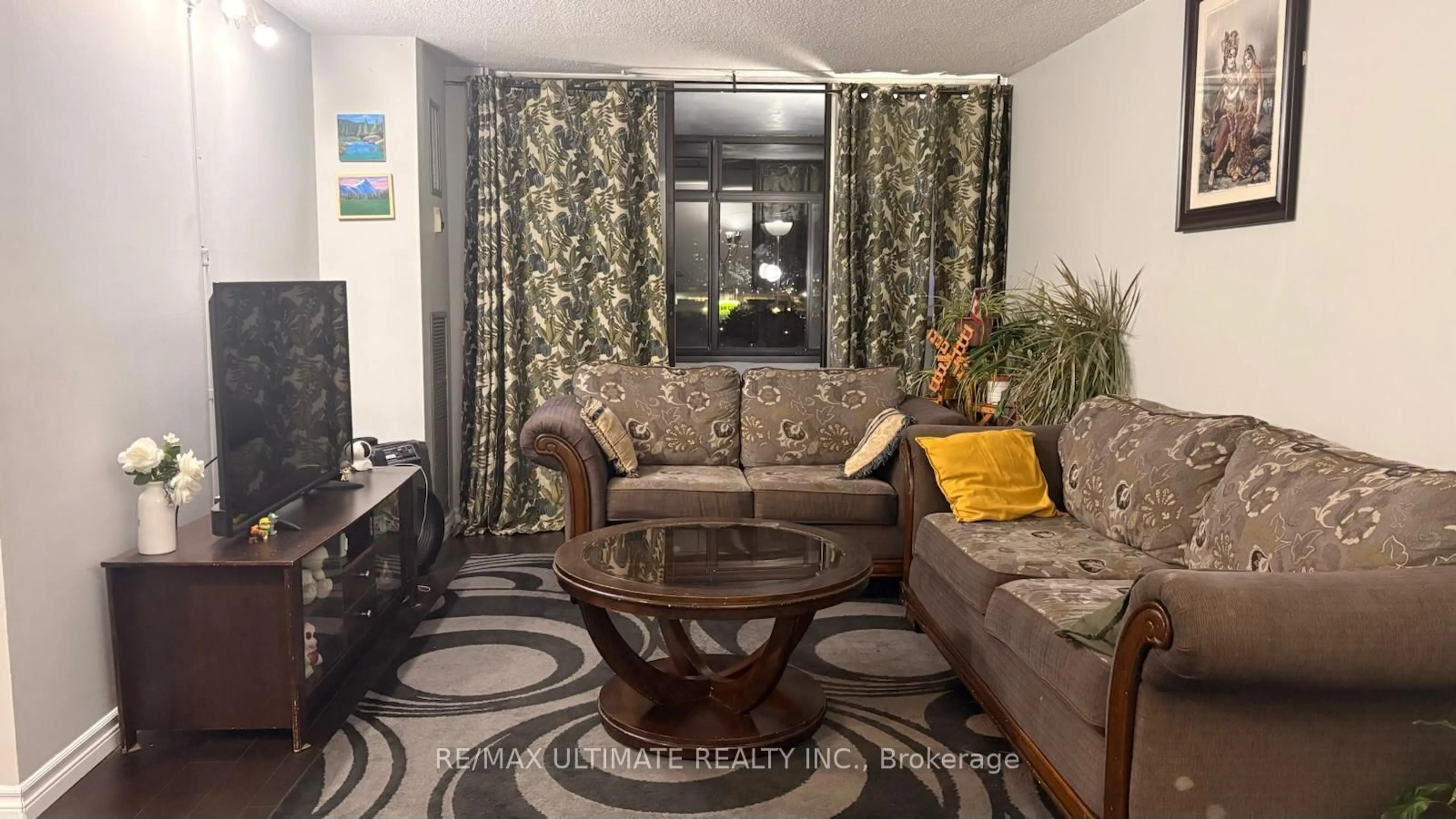 Living room with furniture, unknown for 15 Kensington Rd #710, Brampton Ontario L6T 3W2