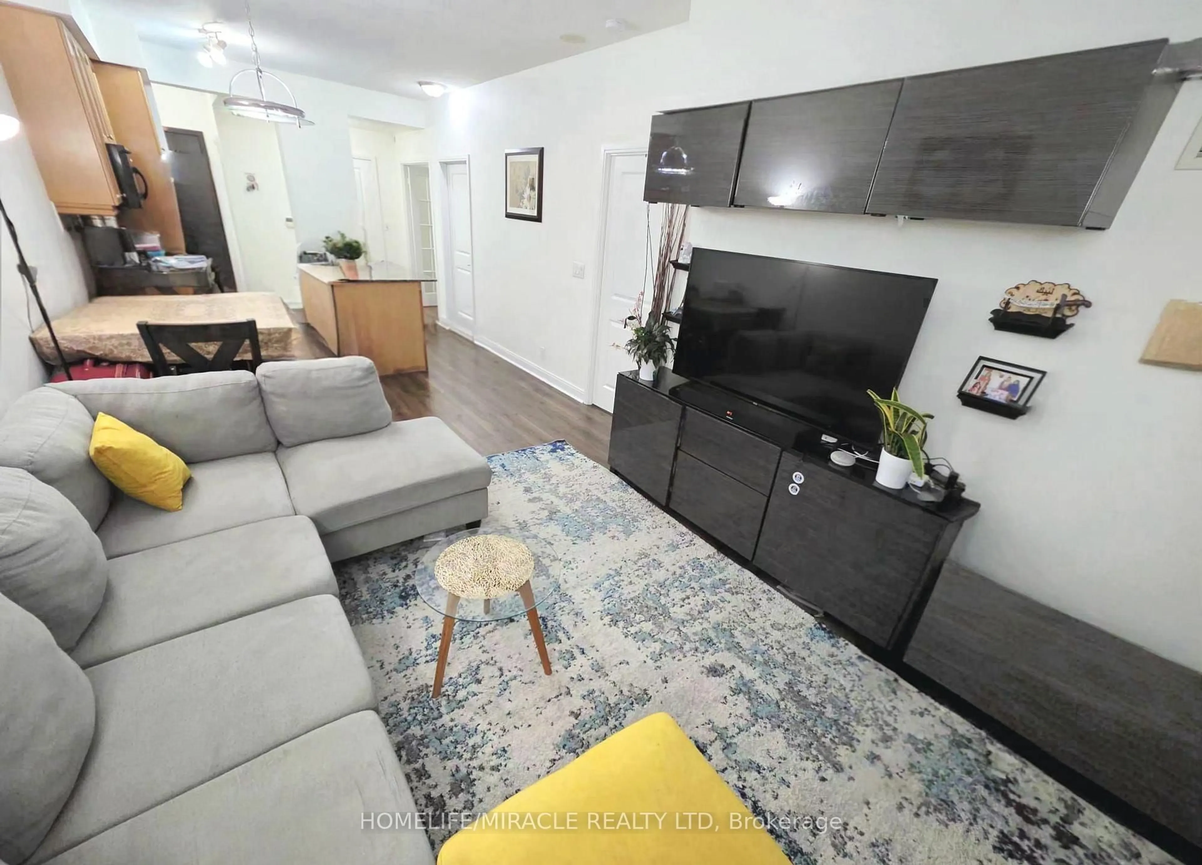 Living room with furniture, unknown for 80 Absolute Ave #801, Mississauga Ontario L4Z 0A2